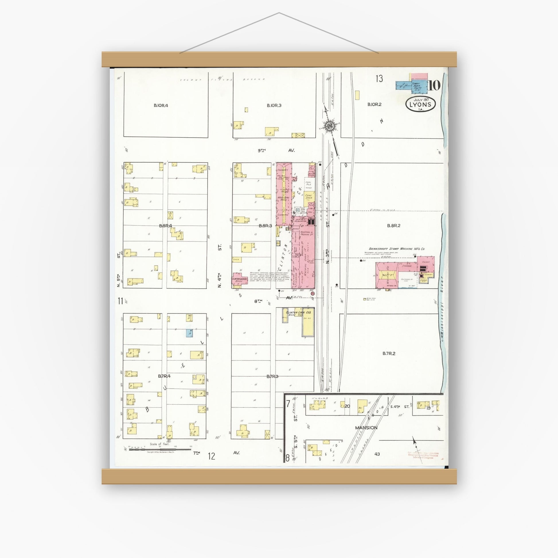 Old map wall art mockup — magnetic wood frame on white wall — Sanborn Fire Insurance Map from Lyons, Clinton County, Iowa (1917), Sheet #0010