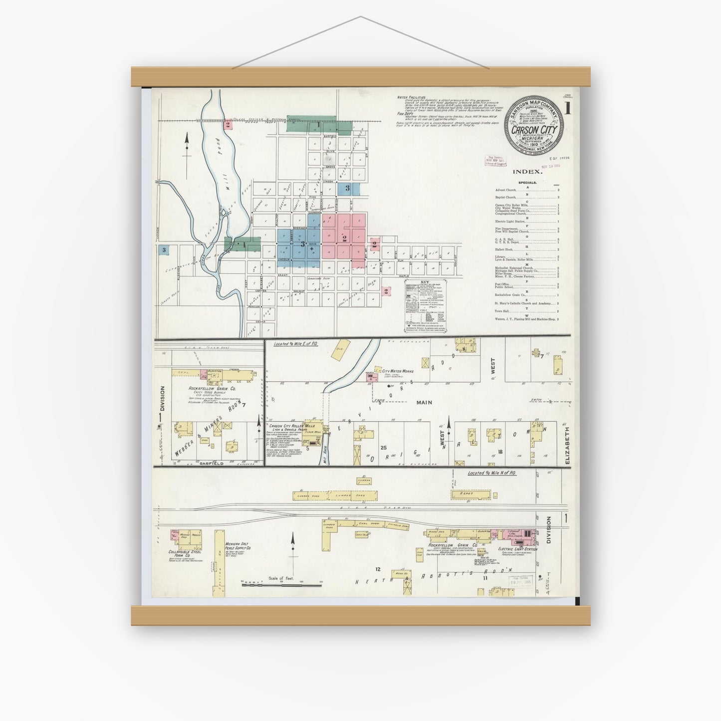 Old map wall art mockup — magnetic wood frame on white wall — Sanborn Fire Insurance Map from Carson City, Montcalm County, Michigan (1910) - Complete Map Set