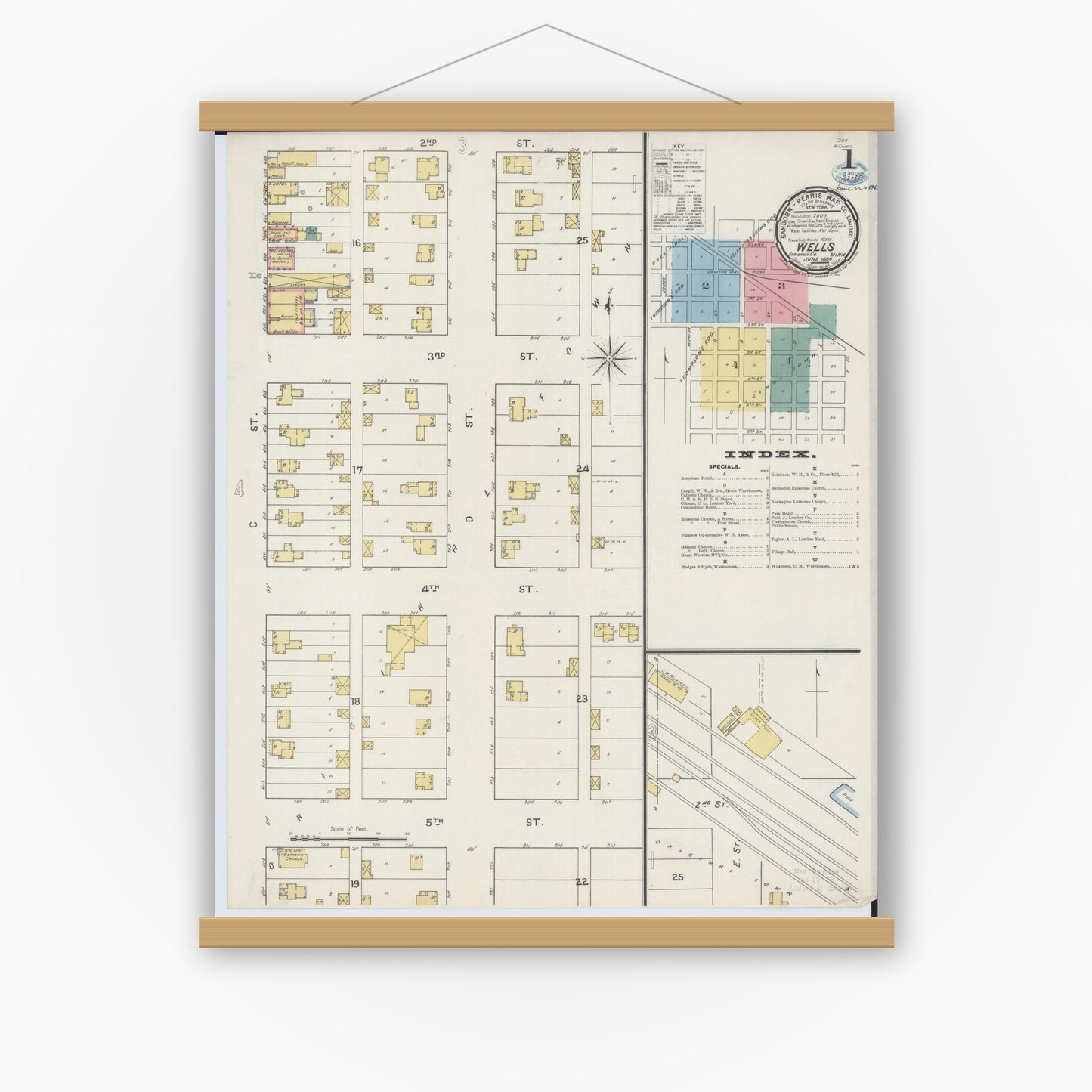 Old map wall art mockup — magnetic wood frame on white wall — Sanborn Fire Insurance Map from Wells, Faribault County, Minnesota (1894) - Complete Map Set