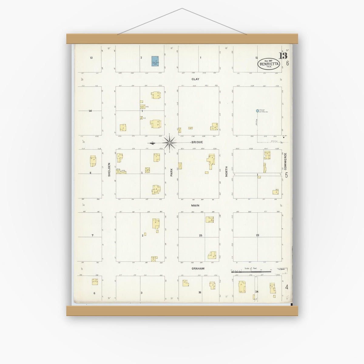 Old map wall art mockup — magnetic wood frame on white wall — Sanborn Fire Insurance Map from Henrietta, Clay County, Texas (1907), Sheet #0013