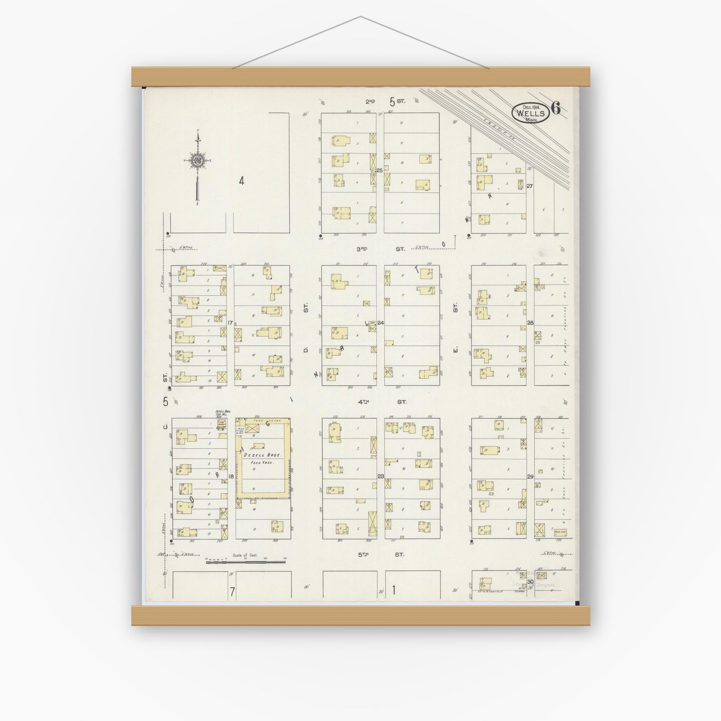 Old map wall art mockup — magnetic wood frame on white wall — Sanborn Fire Insurance Map from Wells, Faribault County, Minnesota (1914), Sheet #0006