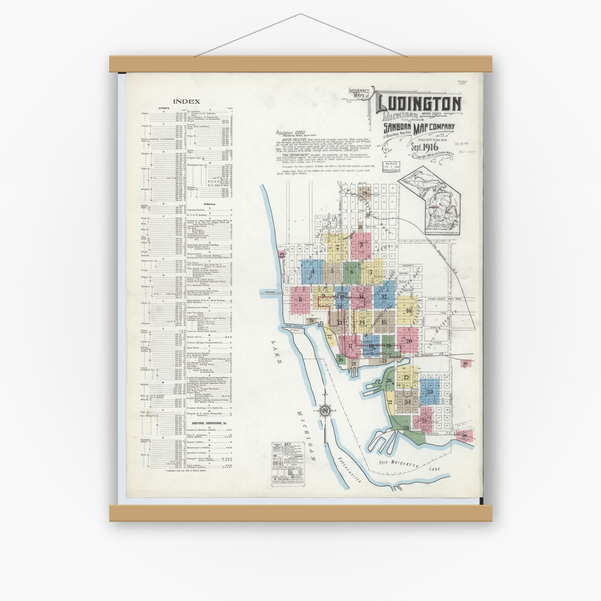 Old map wall art mockup — magnetic wood frame on white wall — Sanborn Fire Insurance Map from Ludington, Mason County, Michigan (1916) - Complete Map Set