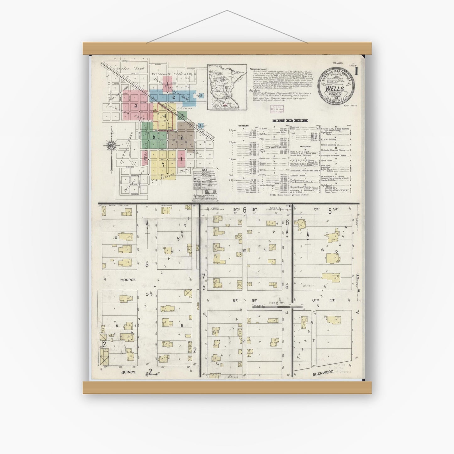 Old map wall art mockup — magnetic wood frame on white wall — Sanborn Fire Insurance Map from Wells, Faribault County, Minnesota (1914), Sheet #0001