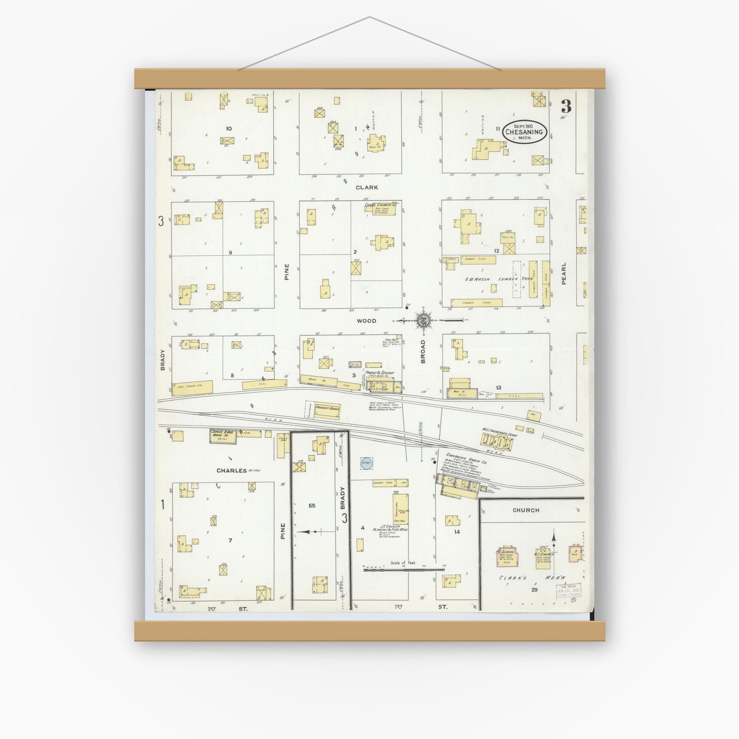 Old map wall art mockup — magnetic wood frame on white wall — Sanborn Fire Insurance Map from Chesaning, Saginaw County, Michigan (1910), Sheet #0003