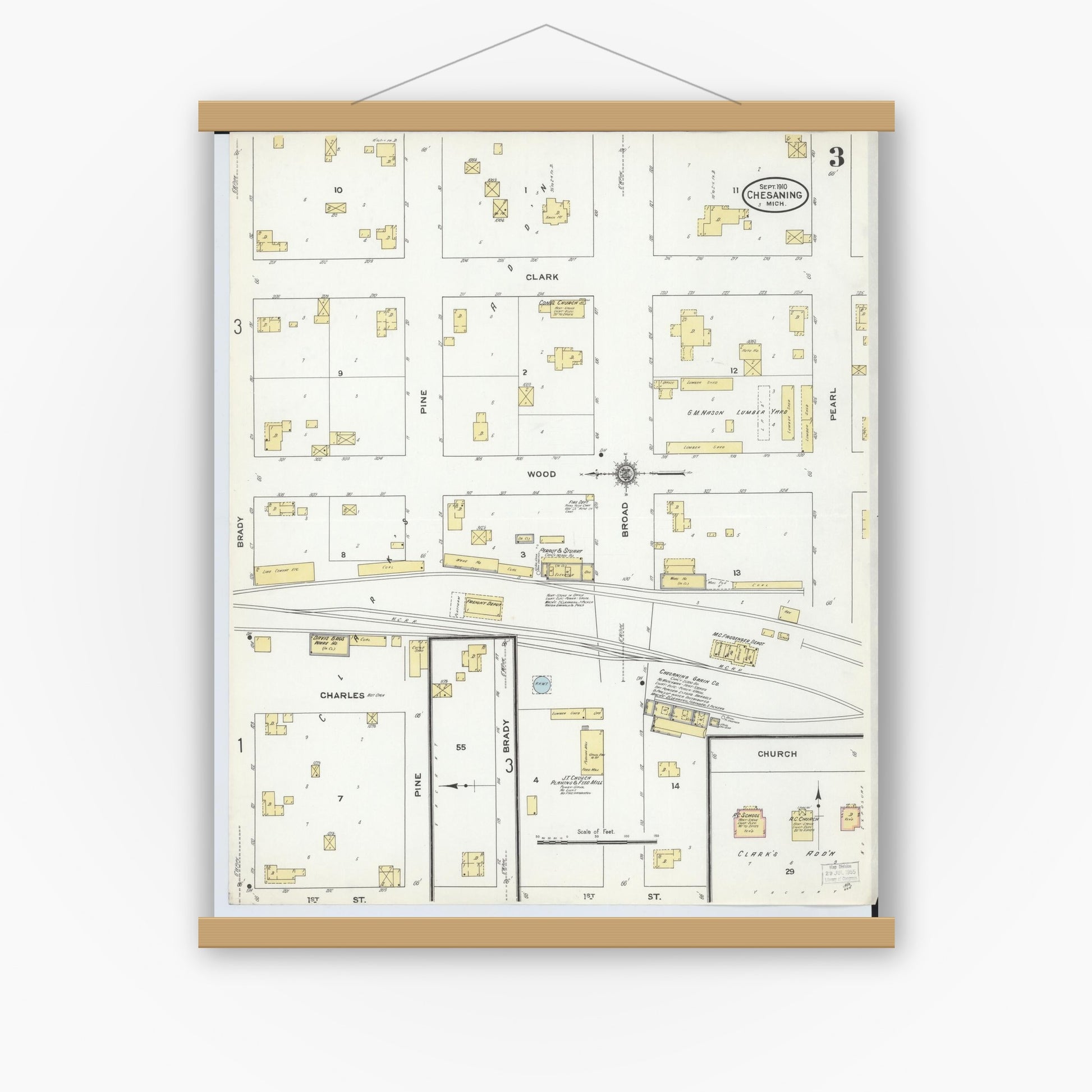 Old map wall art mockup — magnetic wood frame on white wall — Sanborn Fire Insurance Map from Chesaning, Saginaw County, Michigan (1910), Sheet #0003