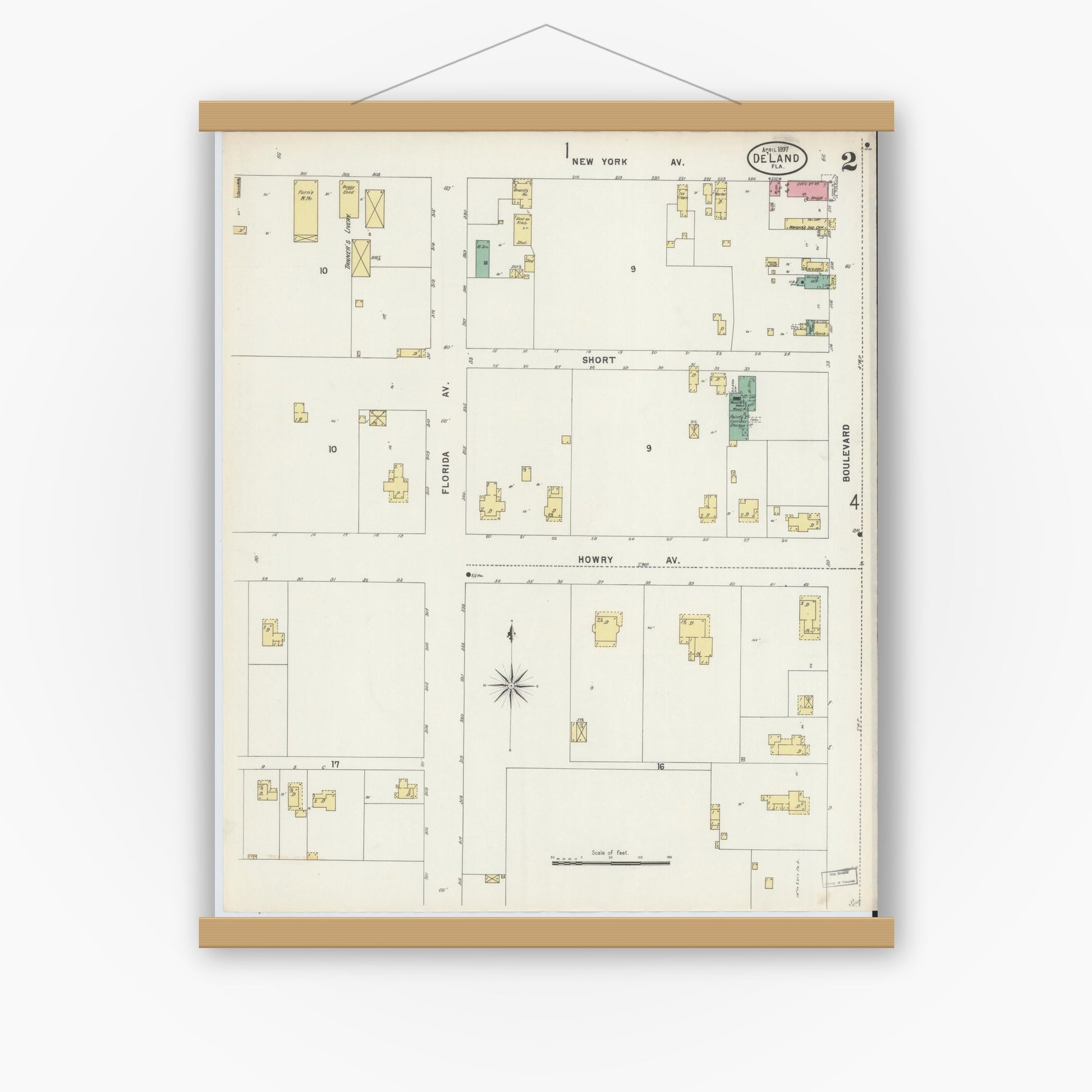 Old map wall art mockup — magnetic wood frame on white wall — Sanborn Fire Insurance Map from De Land, Volusia County, Florida (1897), Sheet #0002