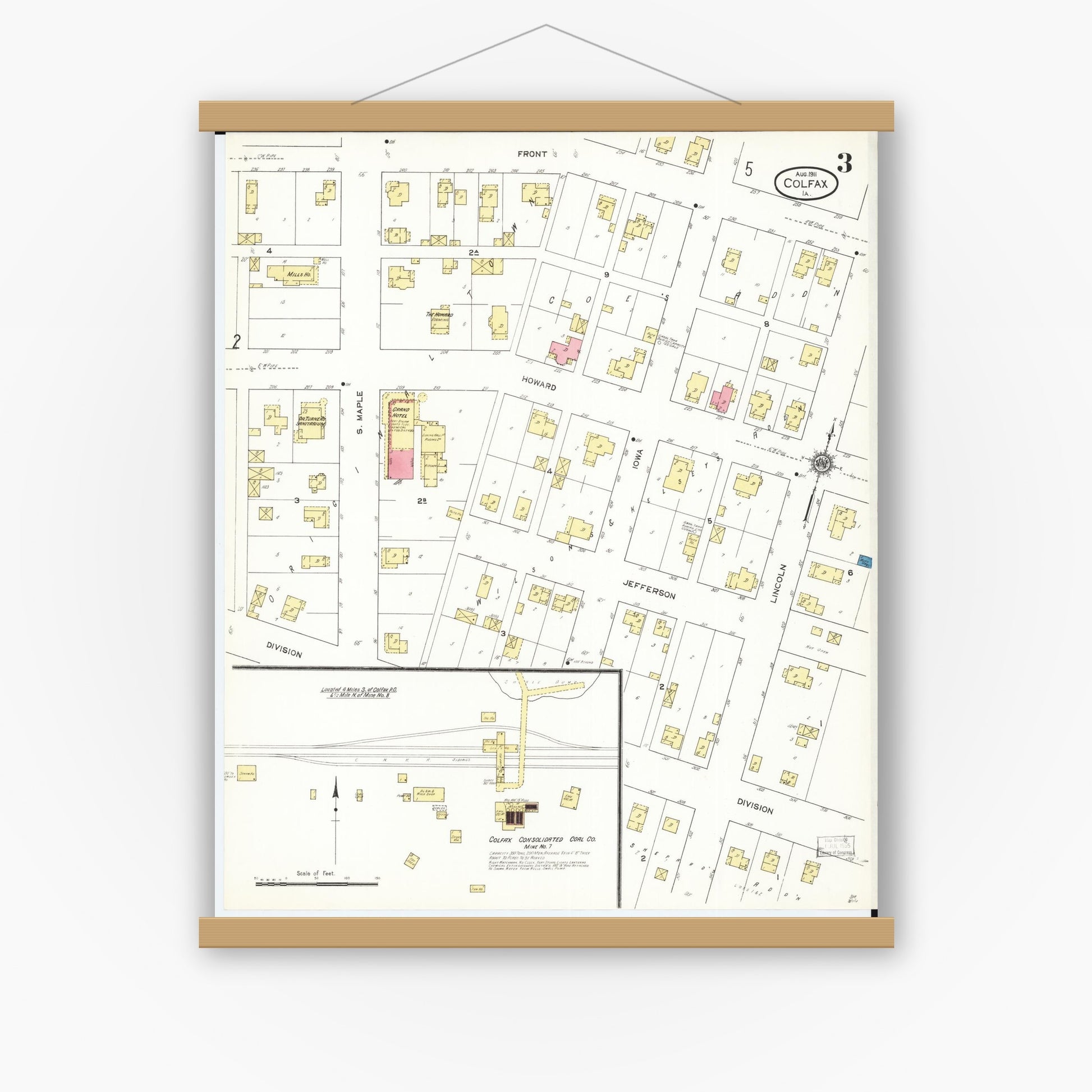 Old map wall art mockup — magnetic wood frame on white wall — Sanborn Fire Insurance Map from Colfax, Jasper County, Iowa (1911), Sheet #0003