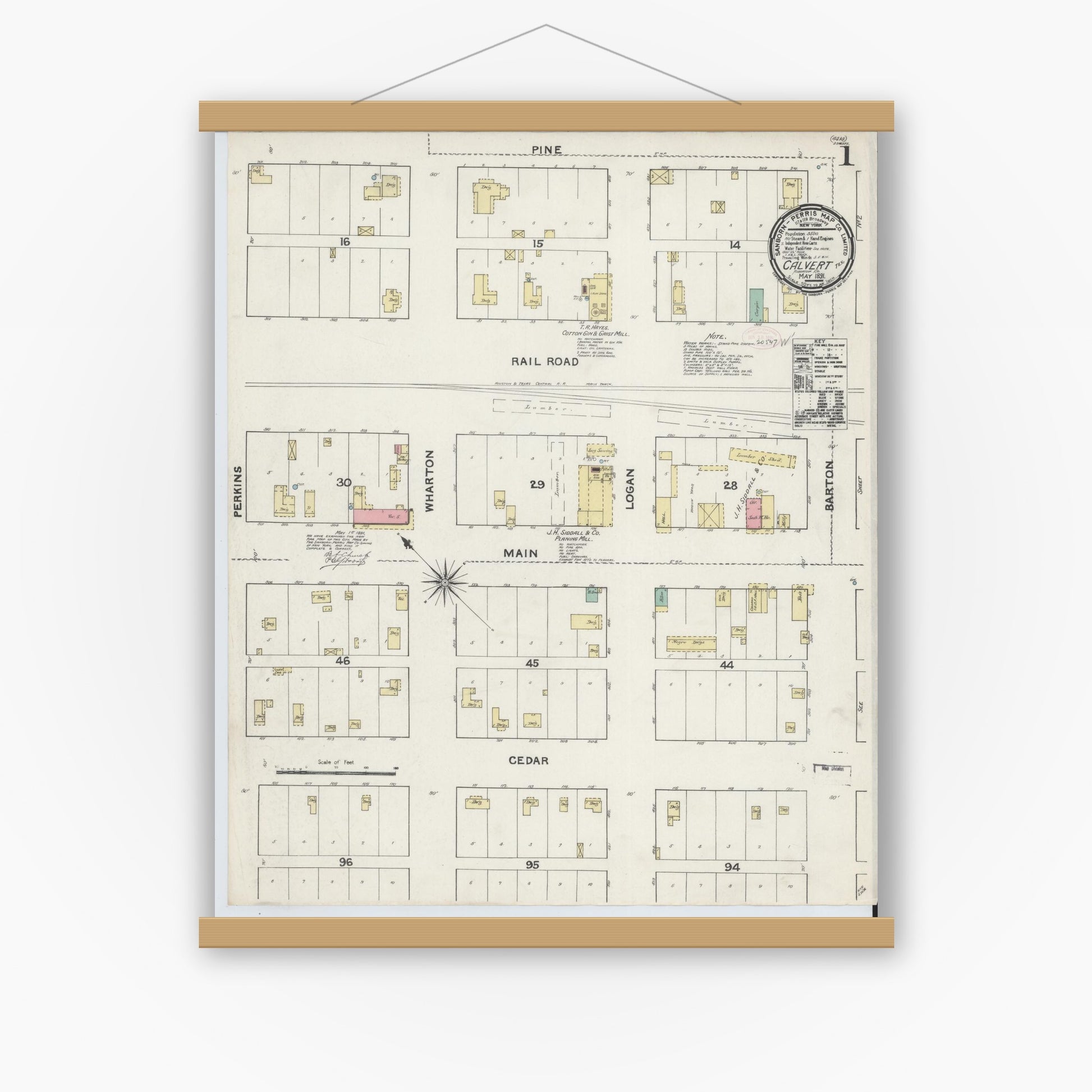 Old map wall art mockup — magnetic wood frame on white wall — Sanborn Fire Insurance Map from Calvert, Robertson County, Texas (1891) - Complete Map Set