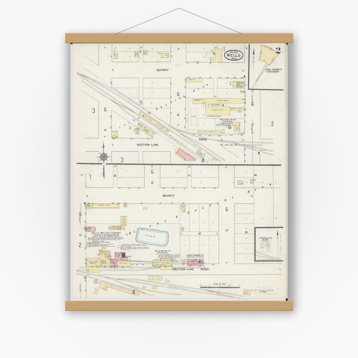 Old map wall art mockup — magnetic wood frame on white wall — Sanborn Fire Insurance Map from Wells, Faribault County, Minnesota (1914), Sheet #0002