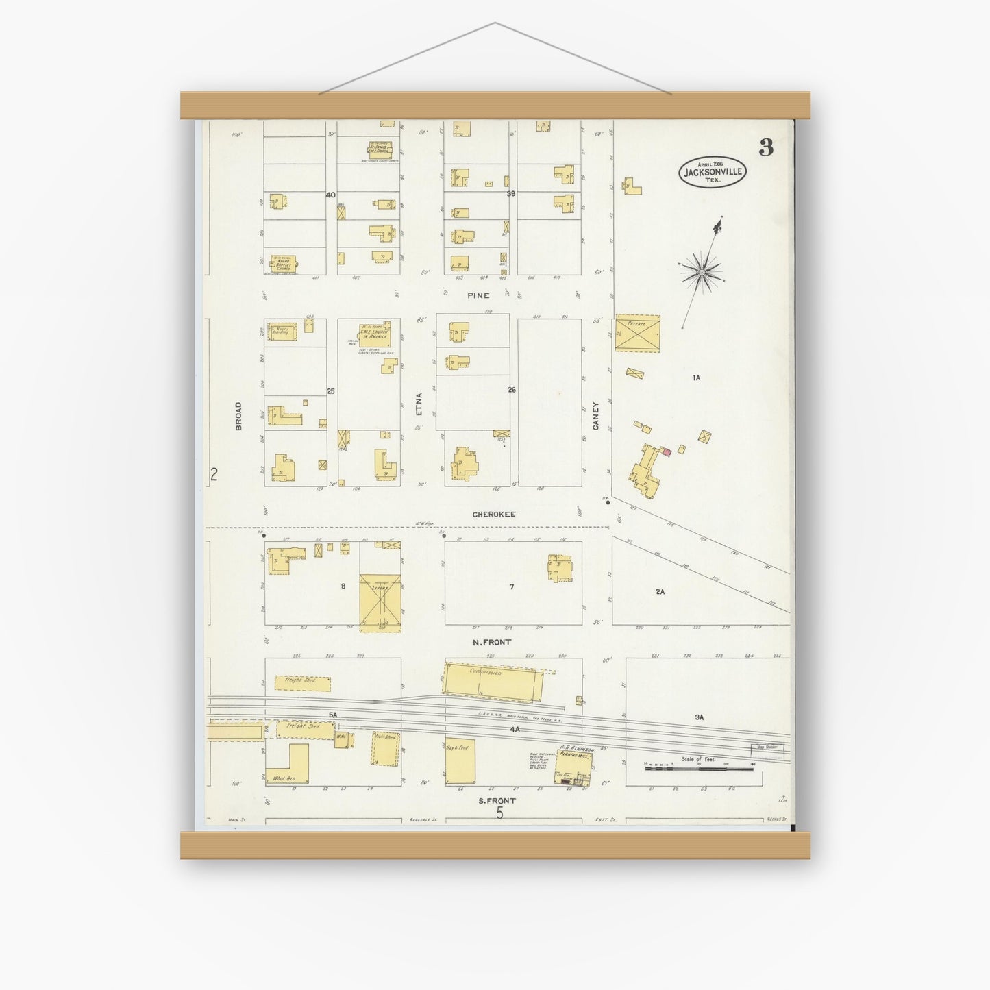 Old map wall art mockup — magnetic wood frame on white wall — Sanborn Fire Insurance Map from Jacksonville, Cherokee County, Texas (1906), Sheet #0003