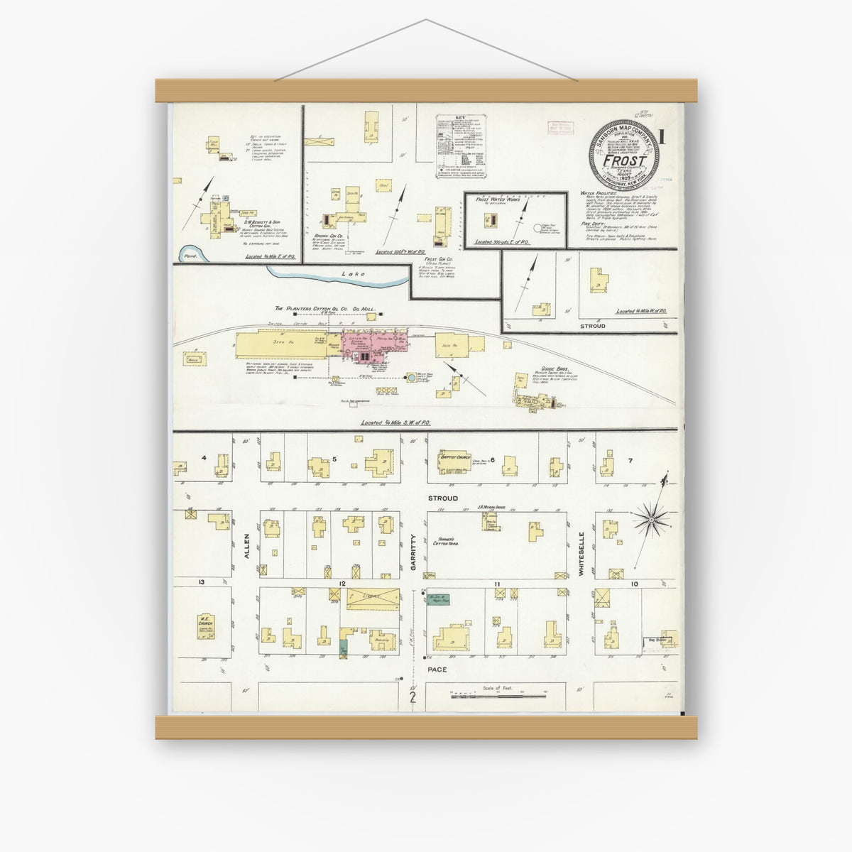 Old map wall art mockup — magnetic wood frame on white wall — Sanborn Fire Insurance Map from Frost, Navarro County, Texas (1909) - Complete Map Set