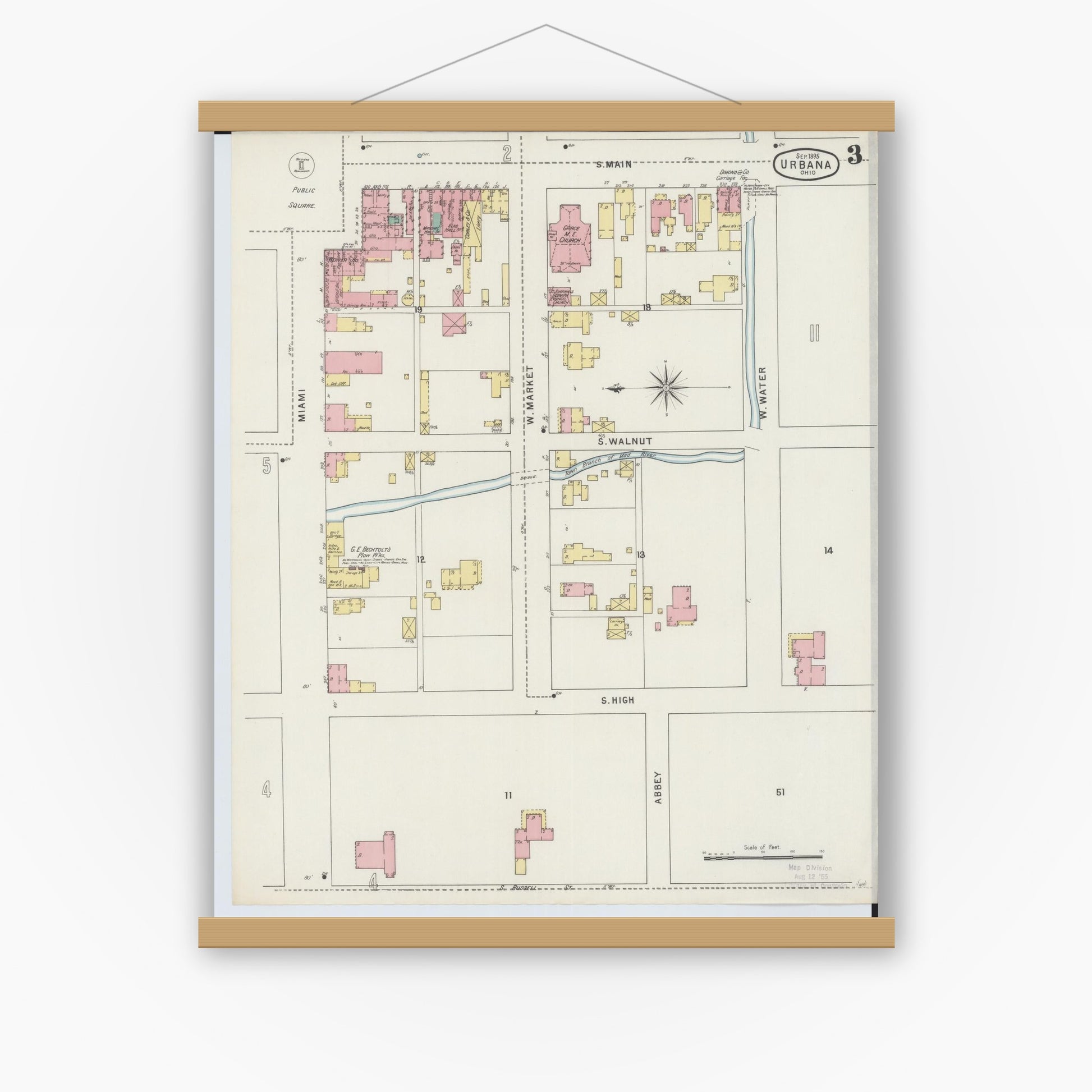Old map wall art mockup — magnetic wood frame on white wall — Sanborn Fire Insurance Map from Urbana, Champaign County, Ohio (1895), Sheet #0003