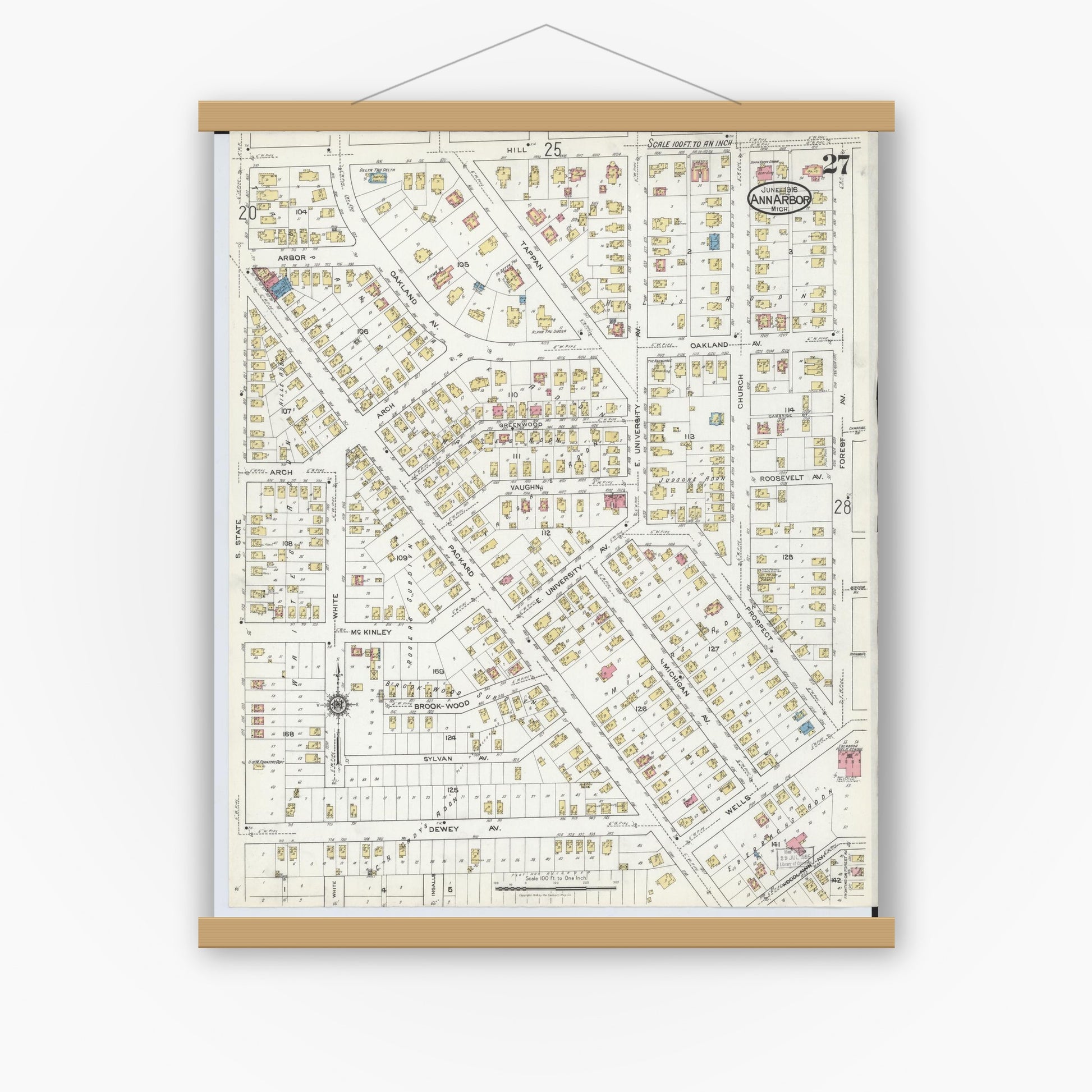 Old map wall art mockup — magnetic wood frame on white wall — Sanborn Fire Insurance Map from Ann Arbor, Washtenaw County, Michigan (1916), Sheet #0027