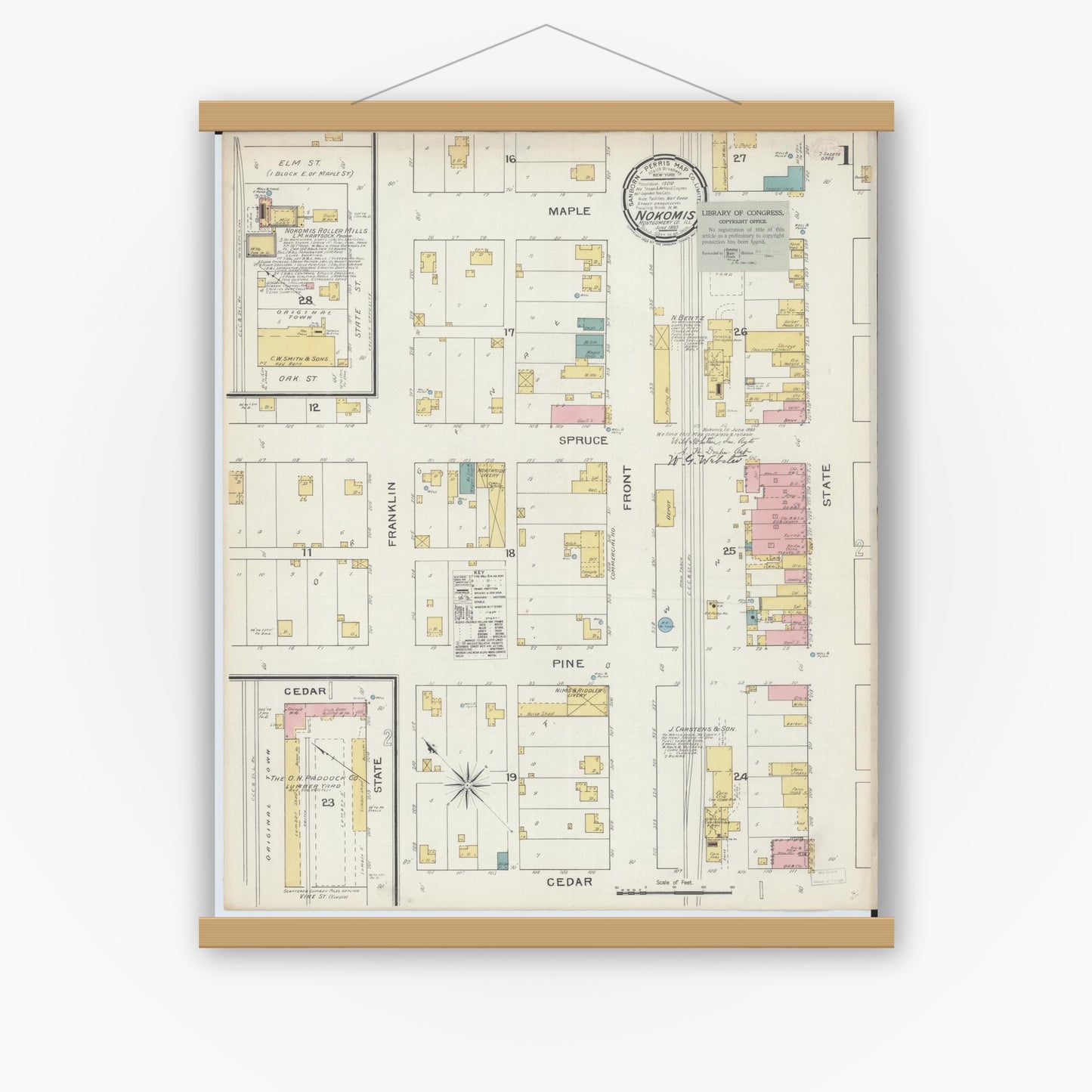 Old map wall art mockup — magnetic wood frame on white wall — Sanborn Fire Insurance Map from Nokomis, Montgomery County, Illinois (1893) - Complete Map Set