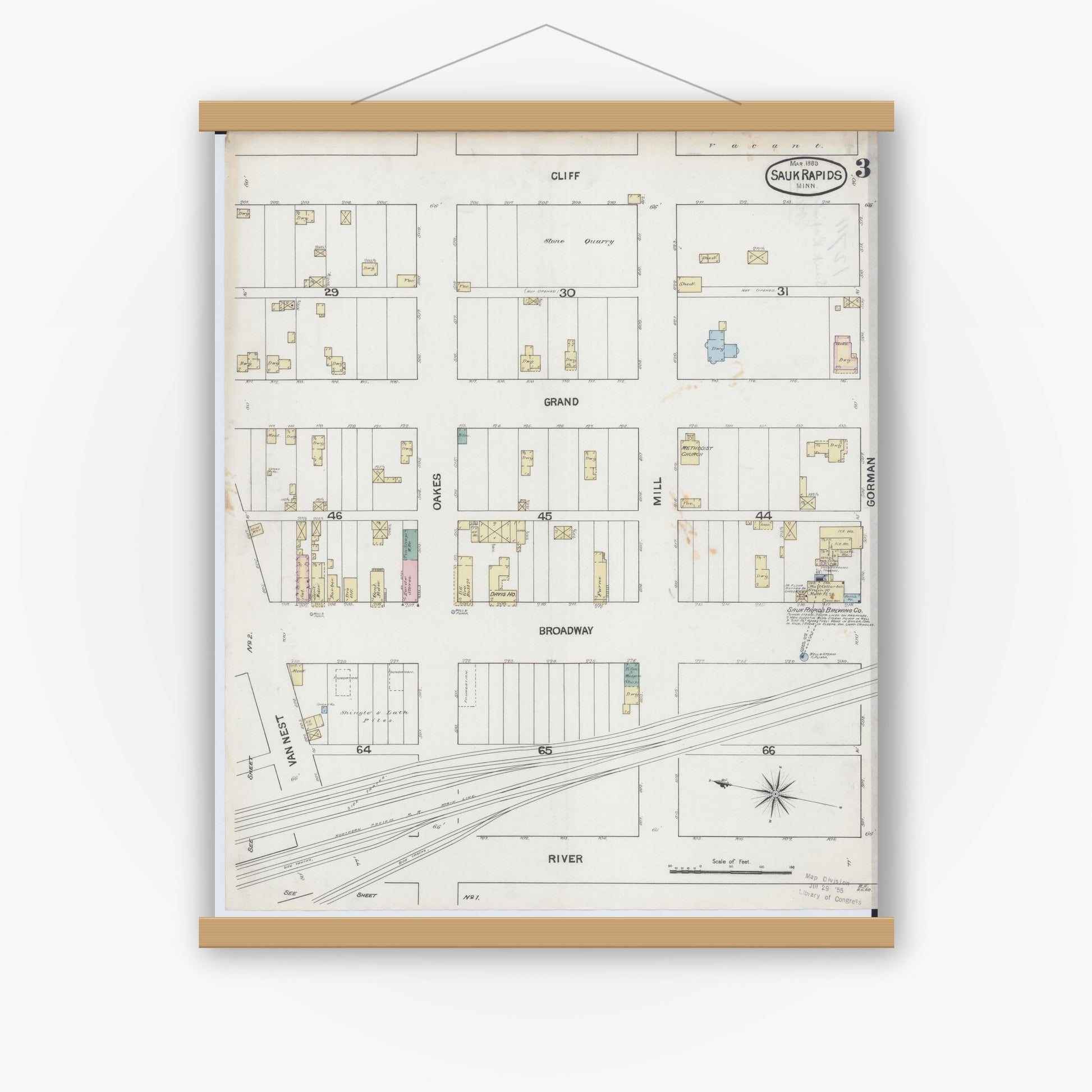 Old map wall art mockup — magnetic wood frame on white wall — Sanborn Fire Insurance Map from Sauk Rapids, Benton County, Minnesota (1889), Sheet #0003