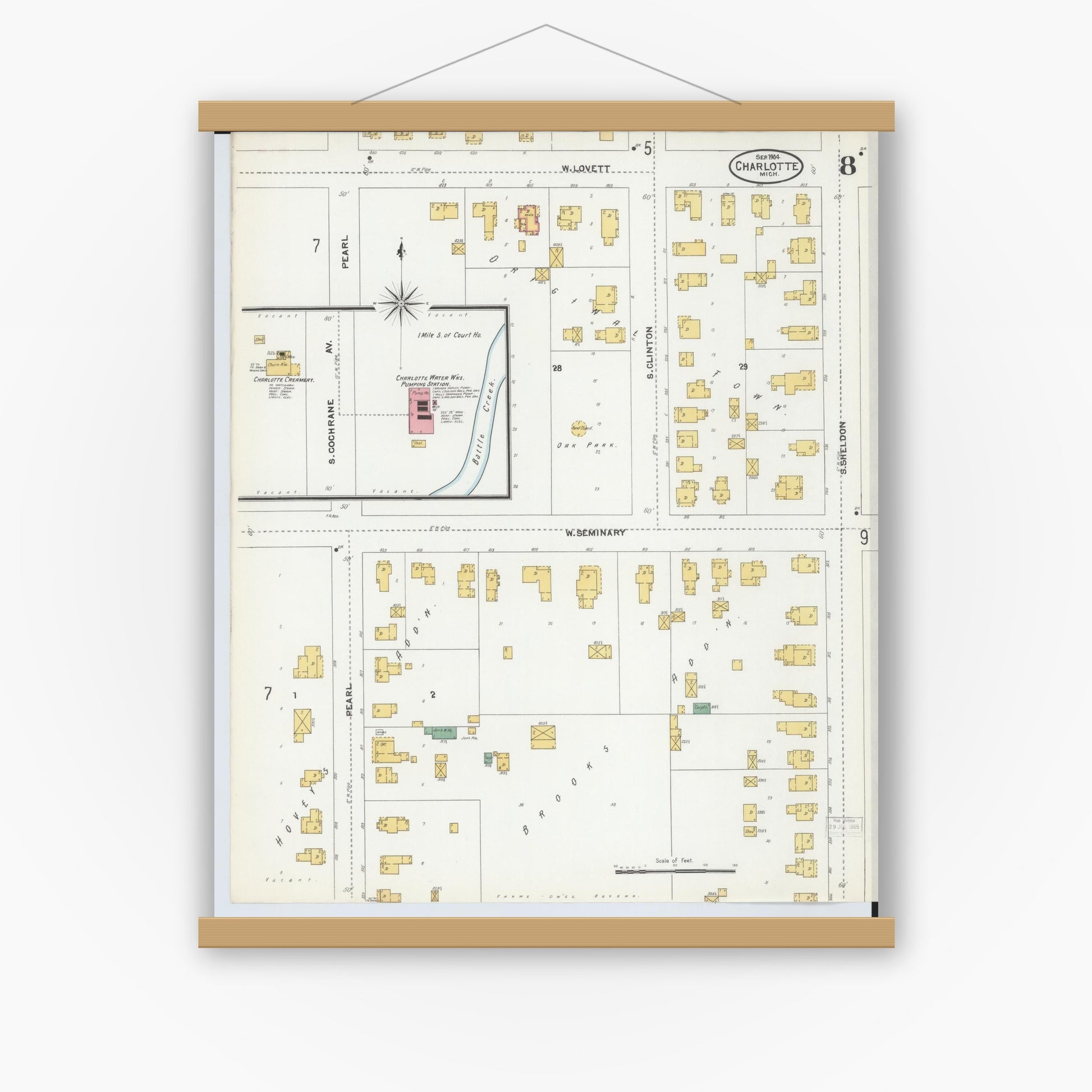 Old map wall art mockup — magnetic wood frame on white wall — Sanborn Fire Insurance Map from Charlotte, Eaton County, Michigan (1904), Sheet #0008