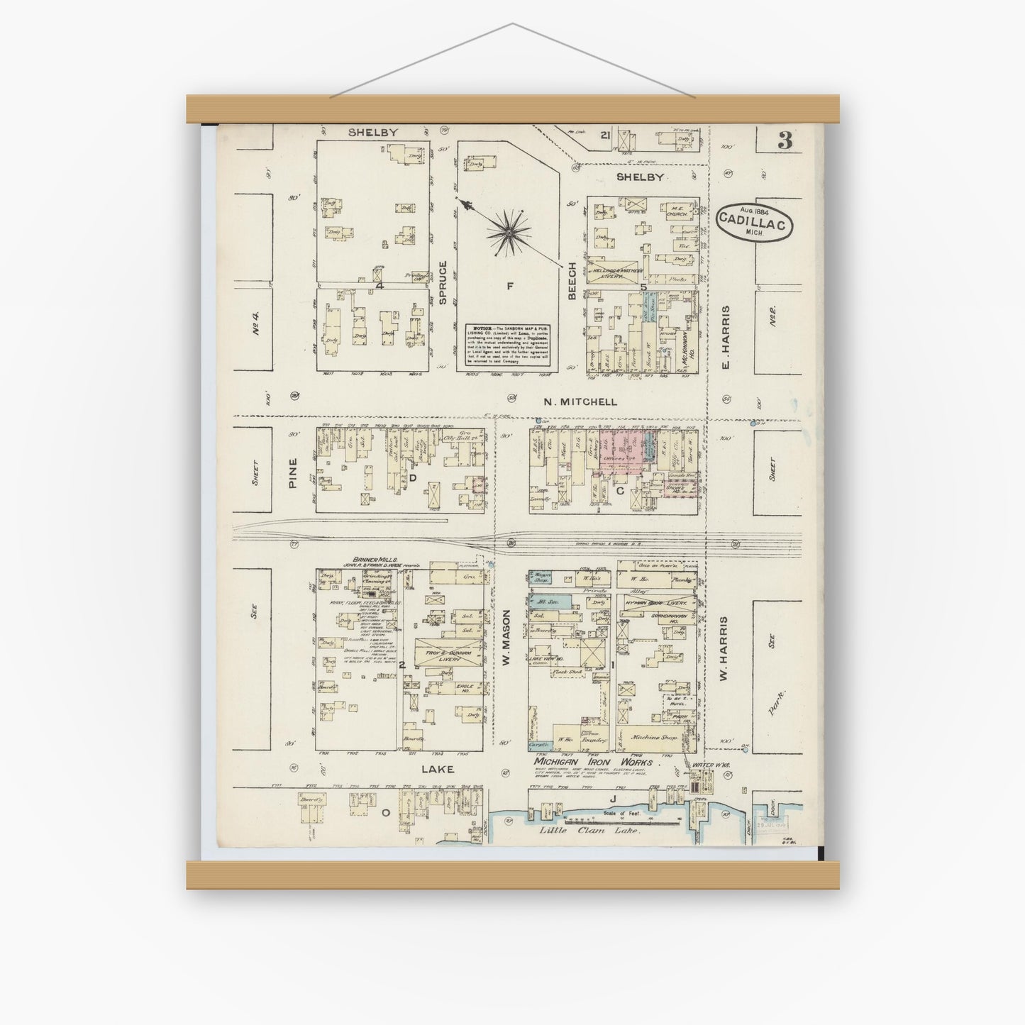Old map wall art mockup — magnetic wood frame on white wall — Sanborn Fire Insurance Map from Cadillac, Wexford County, Michigan (1884), Sheet #0003