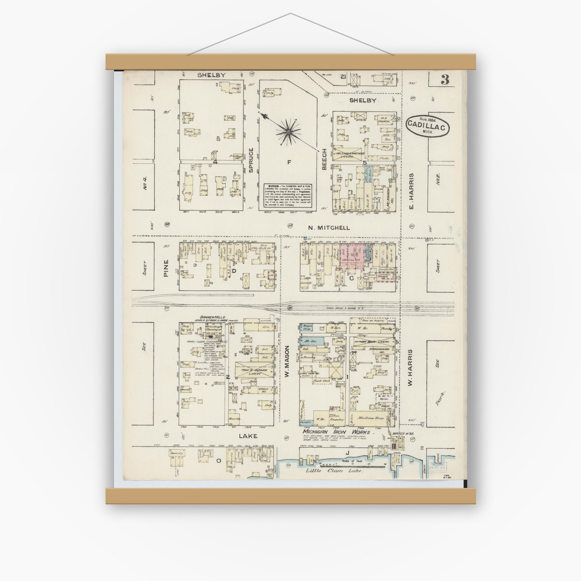 Old map wall art mockup — magnetic wood frame on white wall — Sanborn Fire Insurance Map from Cadillac, Wexford County, Michigan (1884), Sheet #0003