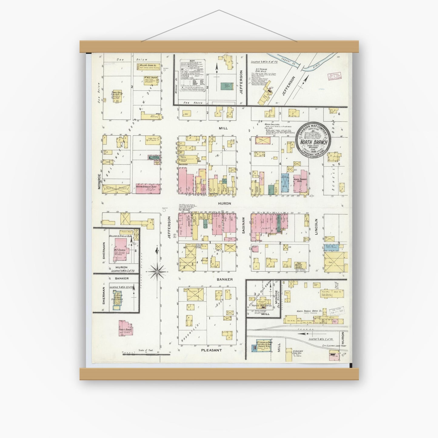 Old map wall art mockup — magnetic wood frame on white wall — Sanborn Fire Insurance Map from North Branch, Lapeer County, Michigan (1909), Sheet #0001