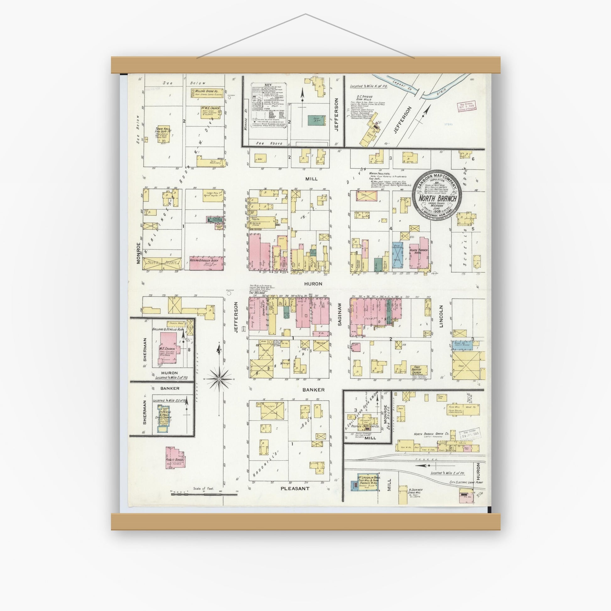Old map wall art mockup — magnetic wood frame on white wall — Sanborn Fire Insurance Map from North Branch, Lapeer County, Michigan (1909), Sheet #0001