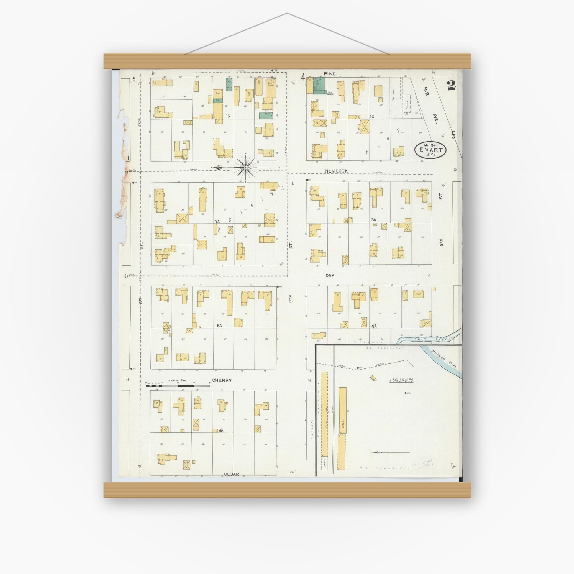 Old map wall art mockup — magnetic wood frame on white wall — Sanborn Fire Insurance Map from Evart, Osceola County, Michigan (1904), Sheet #0002