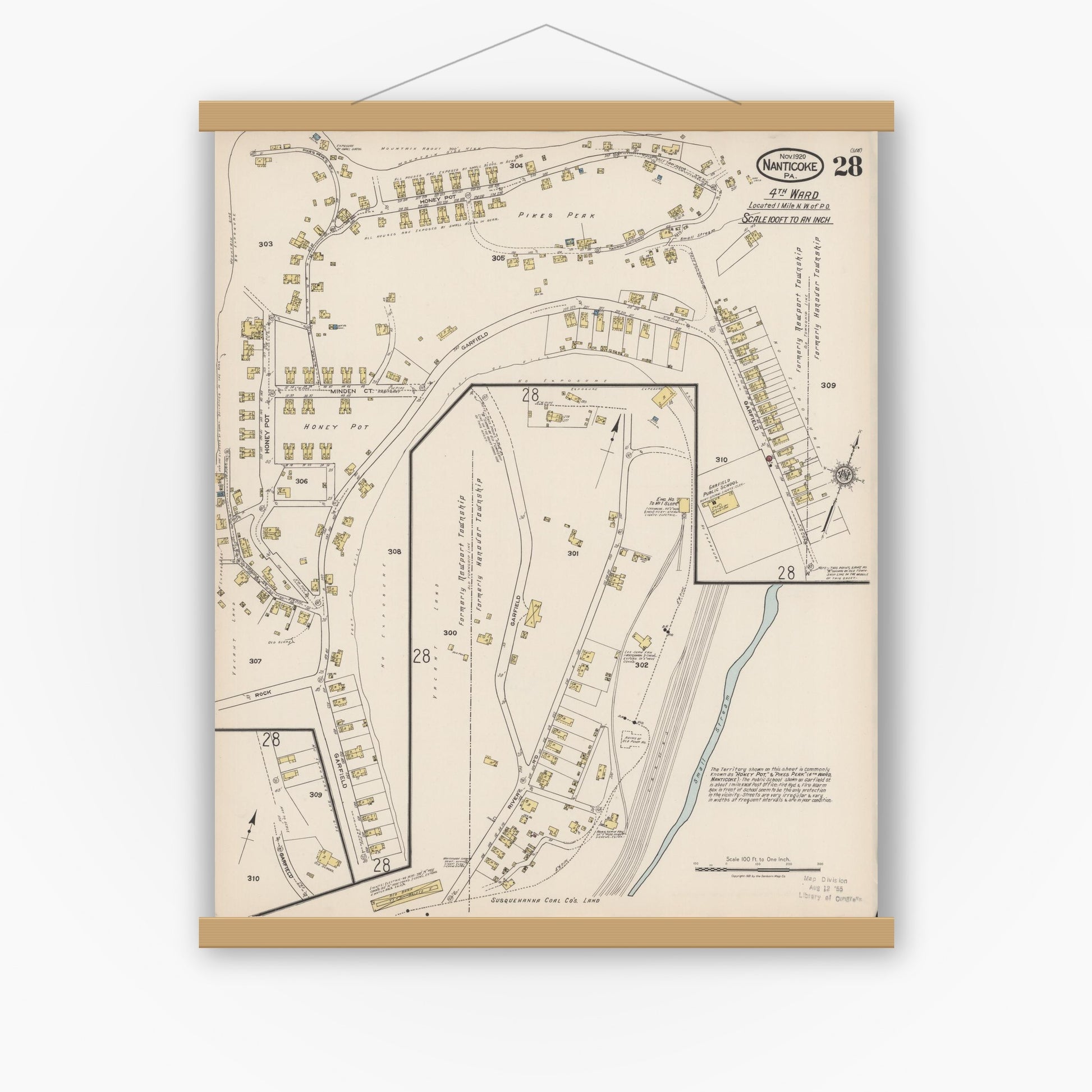 Old map wall art mockup — magnetic wood frame on white wall — Sanborn Fire Insurance Map from Nanticoke, Luzerne County, Pennsylvania (1920), Sheet #0028