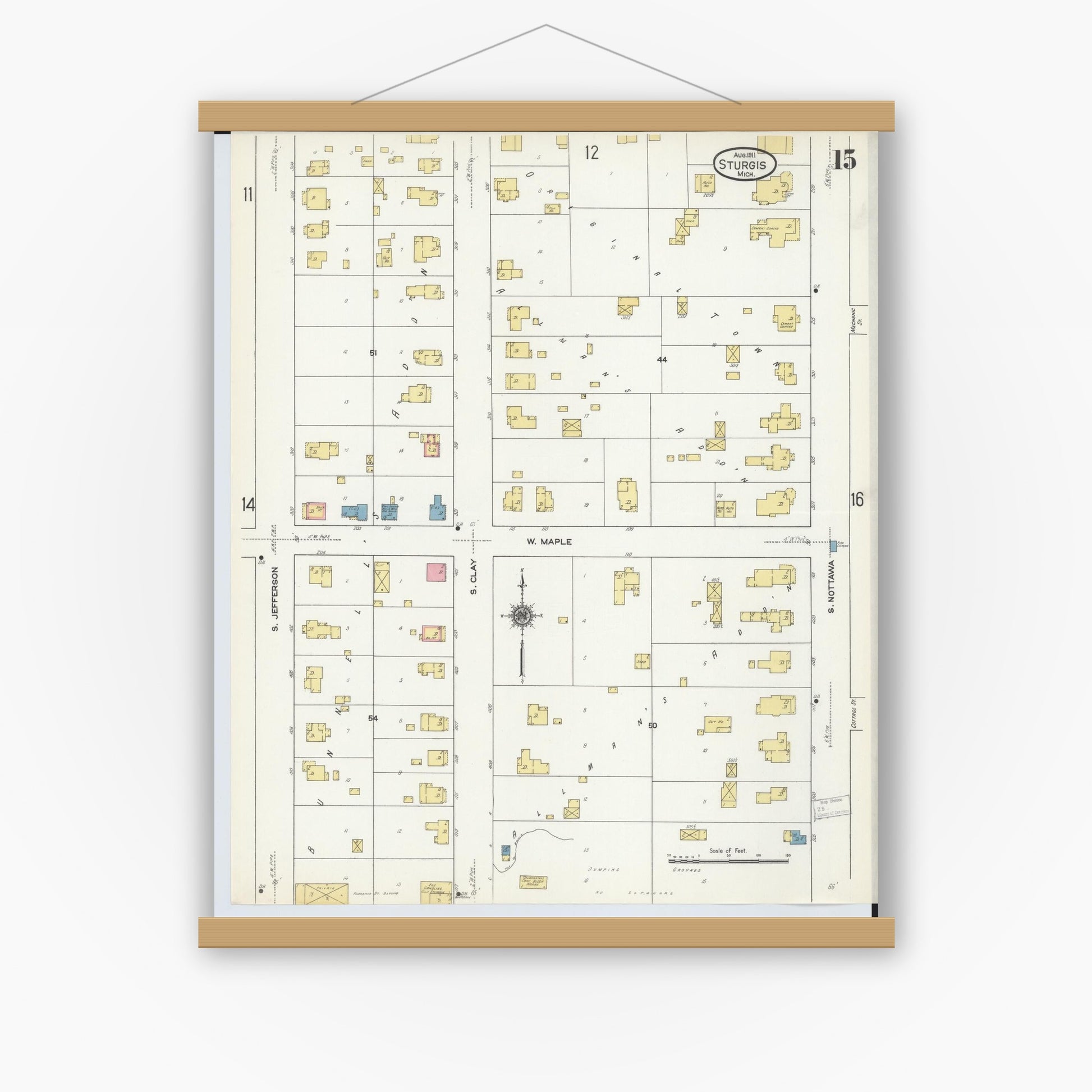Old map wall art mockup — magnetic wood frame on white wall — Sanborn Fire Insurance Map from Sturgis, Saint Joseph County, Michigan (1911), Sheet #0015