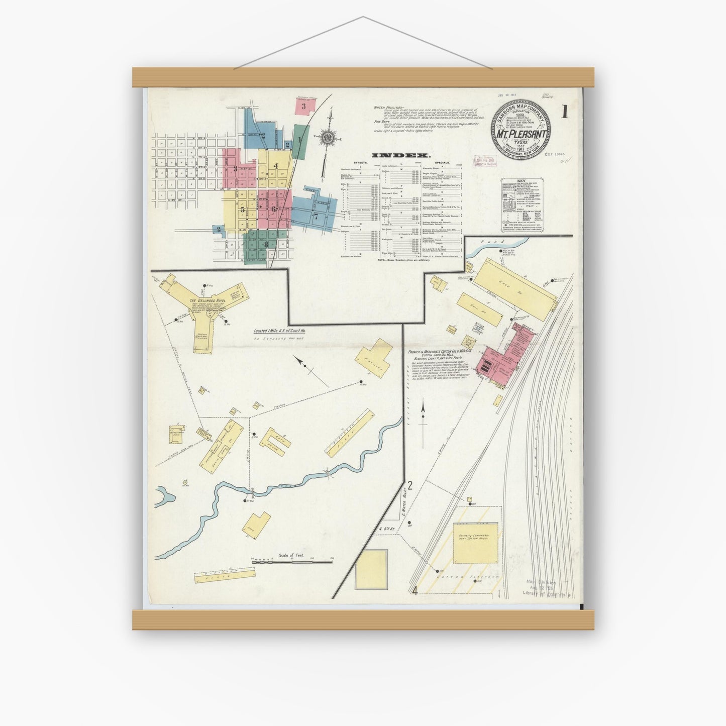 Old map wall art mockup — magnetic wood frame on white wall — Sanborn Fire Insurance Map from Mount Pleasant, Titus County, Texas (1911), Sheet #0001