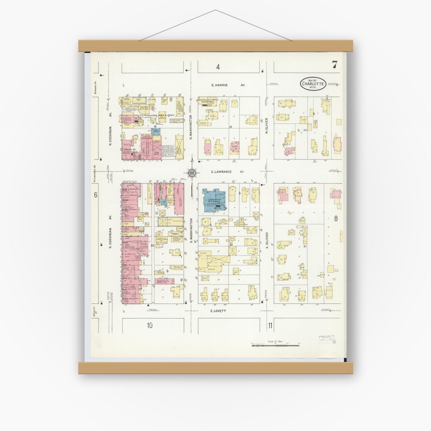 Old map wall art mockup — magnetic wood frame on white wall — Sanborn Fire Insurance Map from Charlotte, Eaton County, Michigan (1911), Sheet #0007
