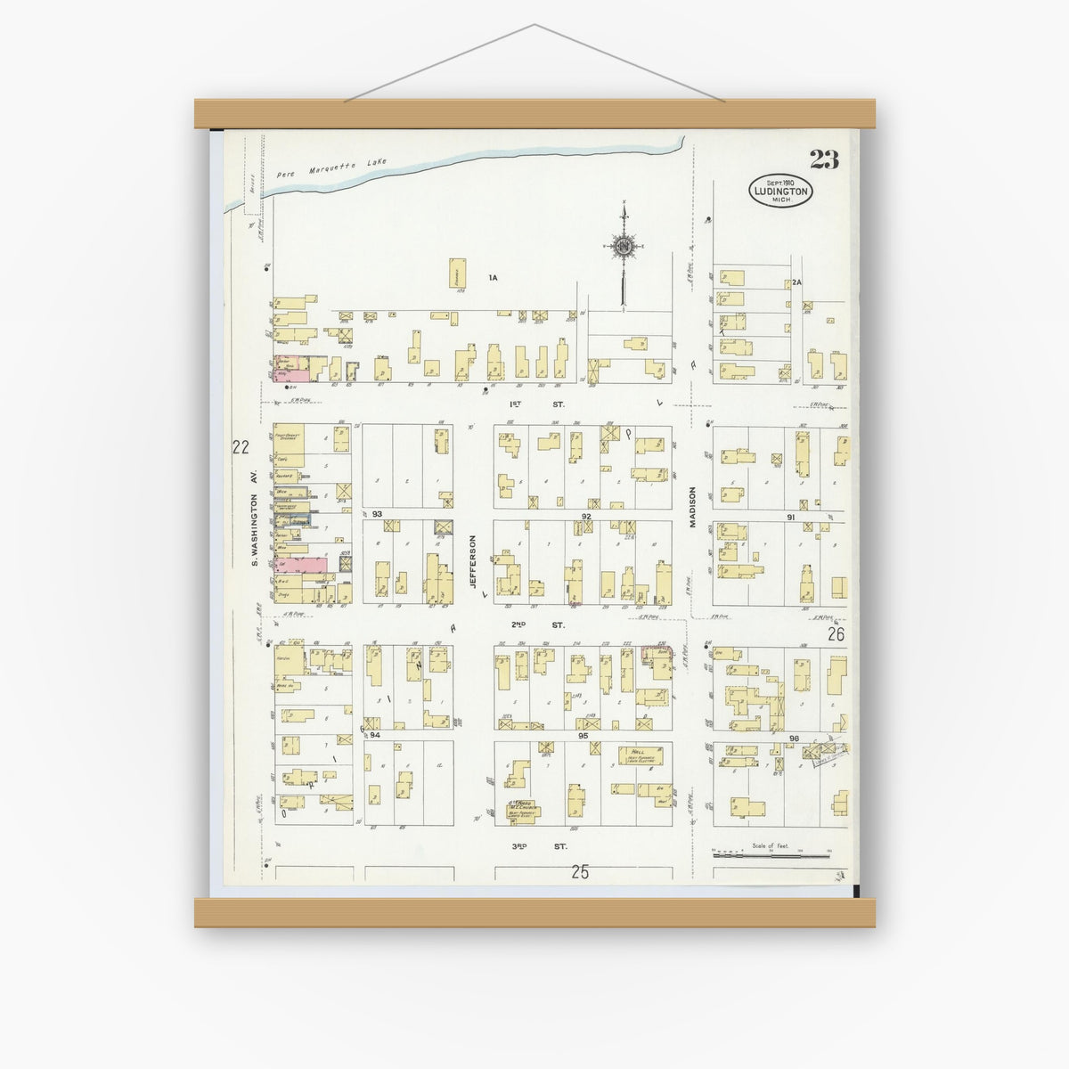 Old map wall art mockup — magnetic wood frame on white wall — Sanborn Fire Insurance Map from Ludington, Mason County, Michigan (1910), Sheet #0023