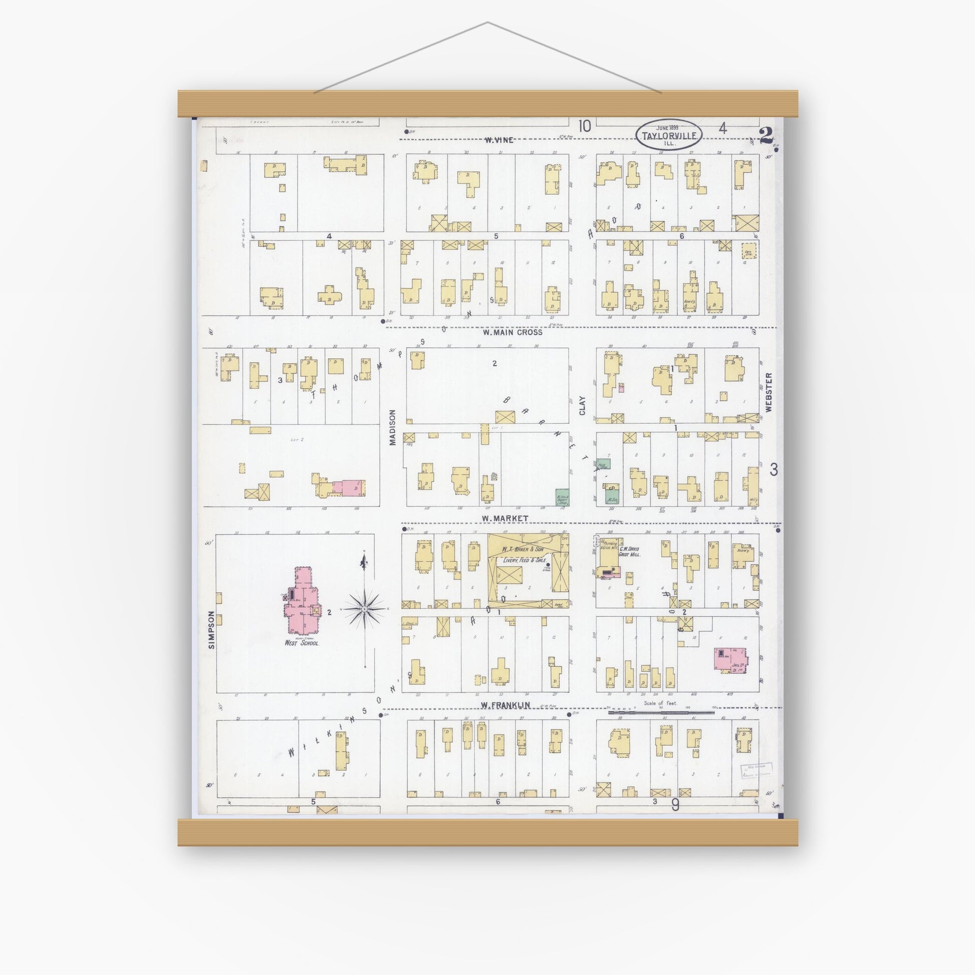 Old map wall art mockup — magnetic wood frame on white wall — Sanborn Fire Insurance Map from Taylorville, Christian County, Illinois (1899), Sheet #0002