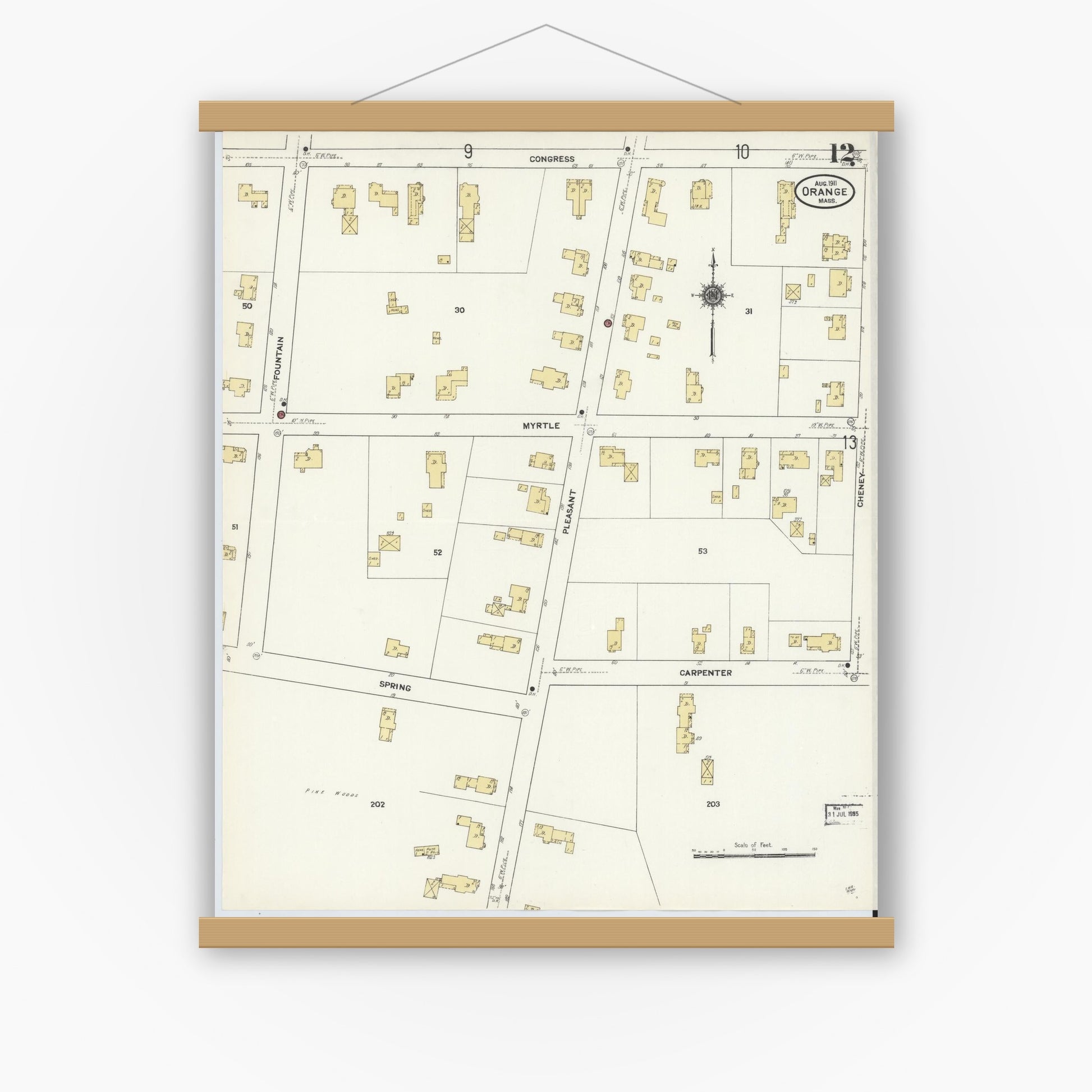 Old map wall art mockup — magnetic wood frame on white wall — Sanborn Fire Insurance Map from Orange, Franklin County, Massachusetts (1911), Sheet #0012
