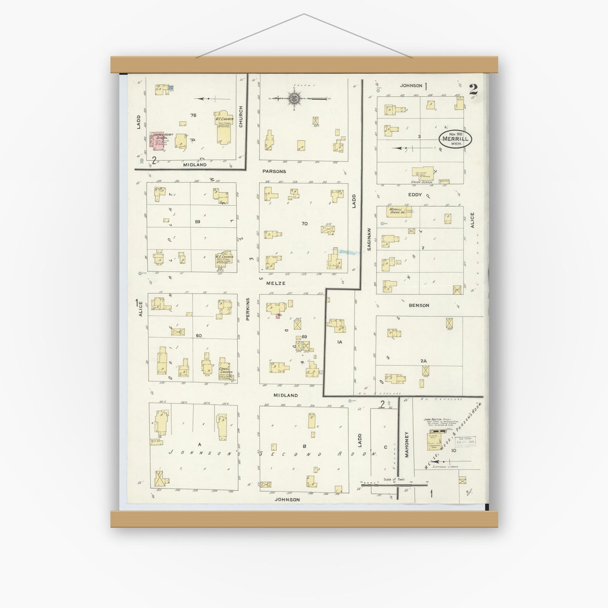 Old map wall art mockup — magnetic wood frame on white wall — Sanborn Fire Insurance Map from Merrill, Saginaw County, Michigan (1910), Sheet #0002
