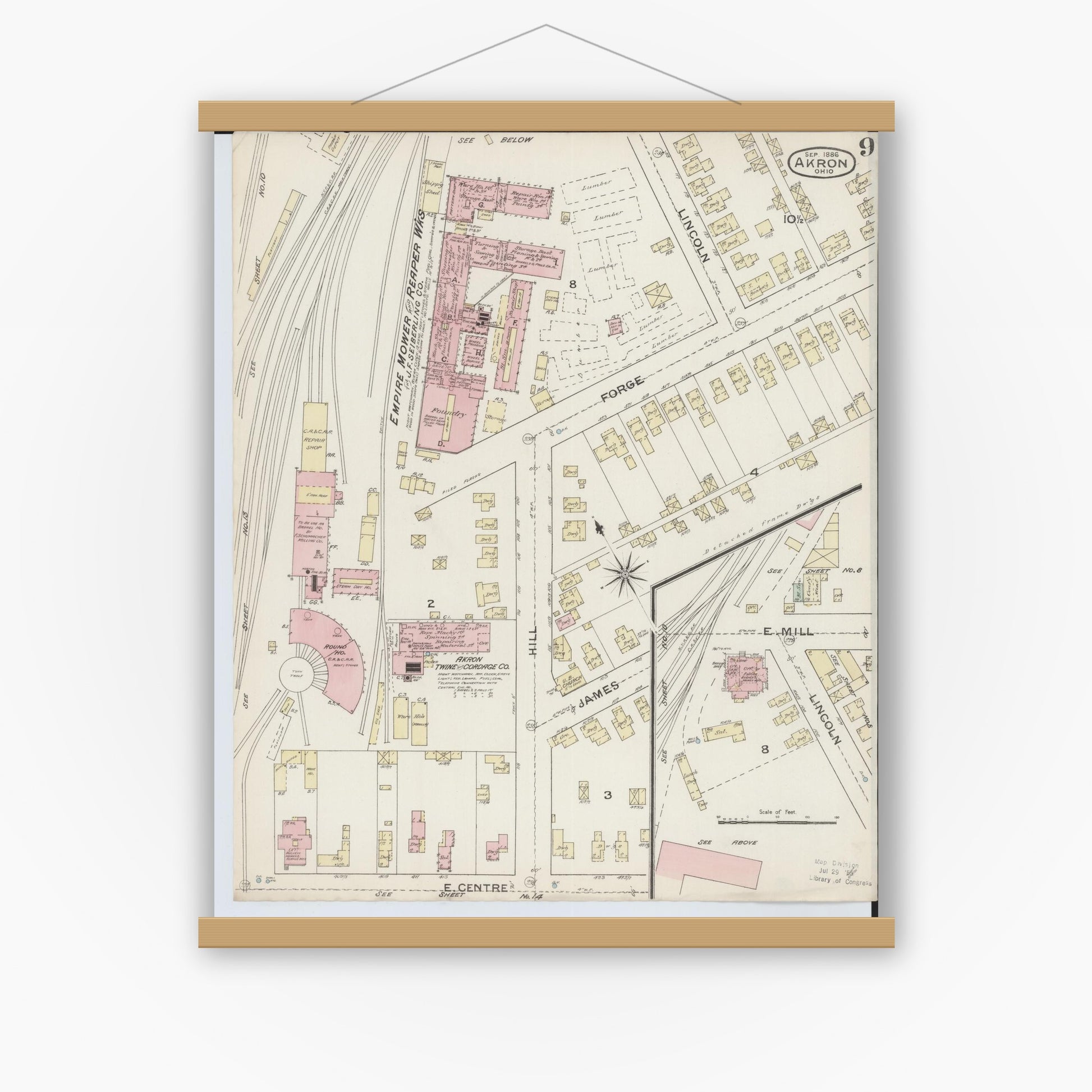 Old map wall art mockup — magnetic wood frame on white wall — Sanborn Fire Insurance Map from Akron, Summit County, Ohio (1886), Sheet #0009
