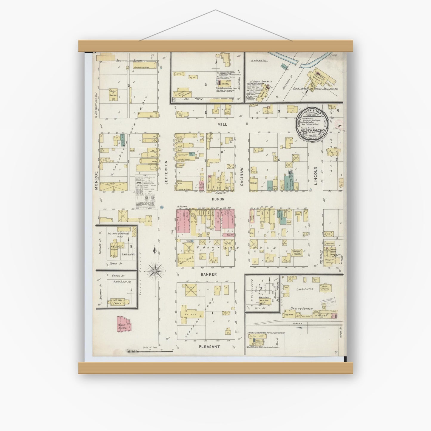 Old map wall art mockup — magnetic wood frame on white wall — Sanborn Fire Insurance Map from North Branch, Lapeer County, Michigan (1895), Sheet #0001