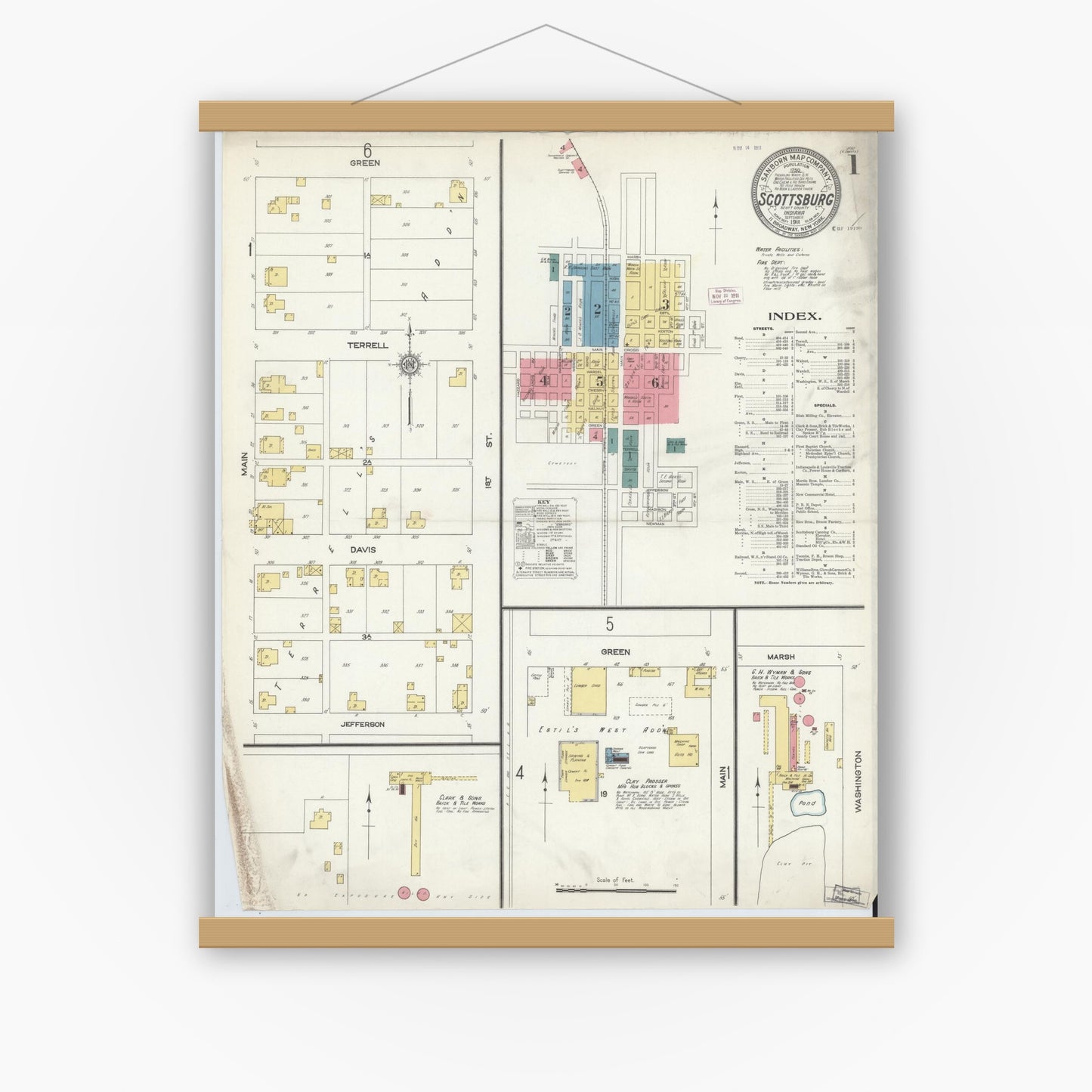Old map wall art mockup — magnetic wood frame on white wall — Sanborn Fire Insurance Map from Scottsburg, Scott County, Indiana (1911) - Complete Map Set