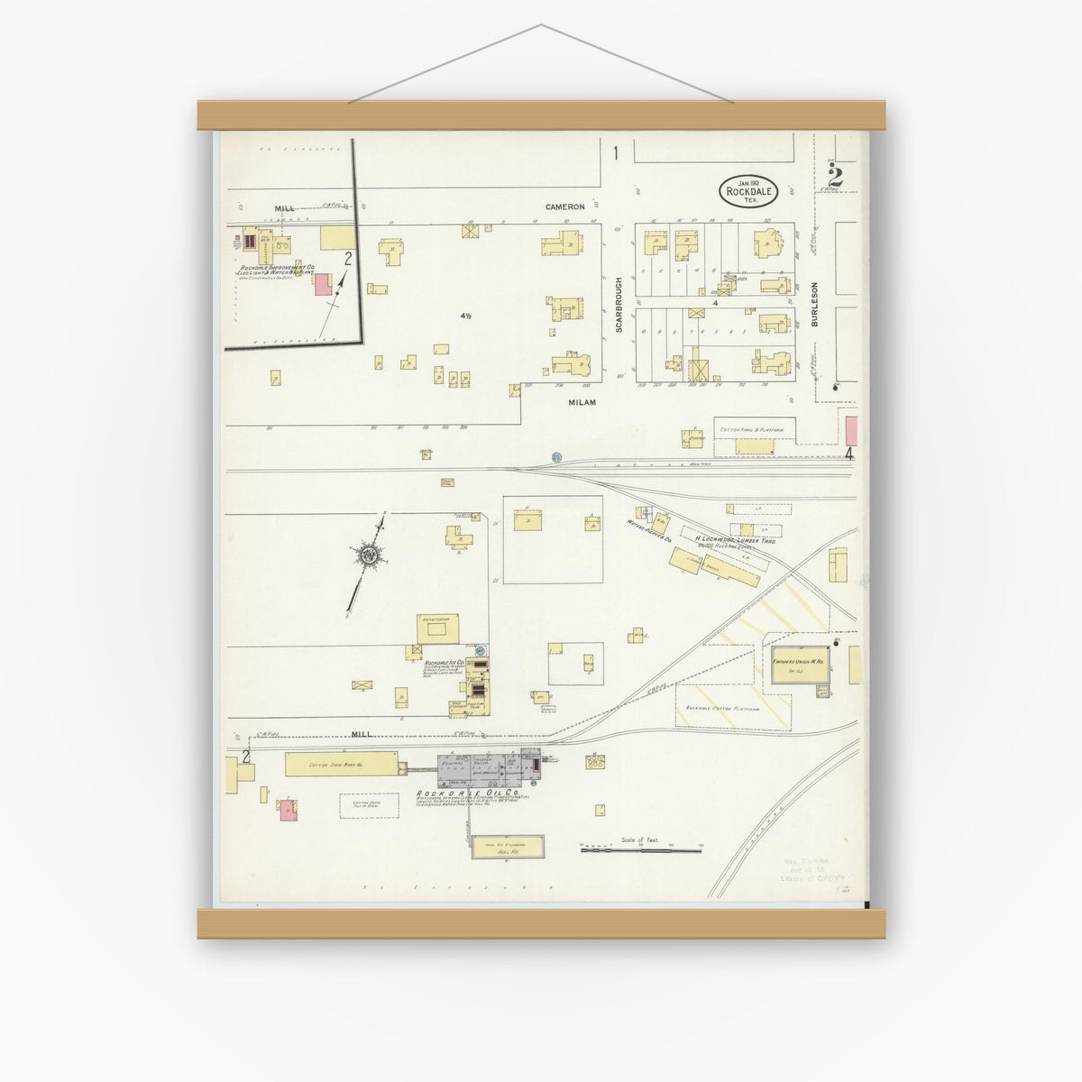 Old map wall art mockup — magnetic wood frame on white wall — Sanborn Fire Insurance Map from Rockdale, Milam County, Texas (1912), Sheet #0002
