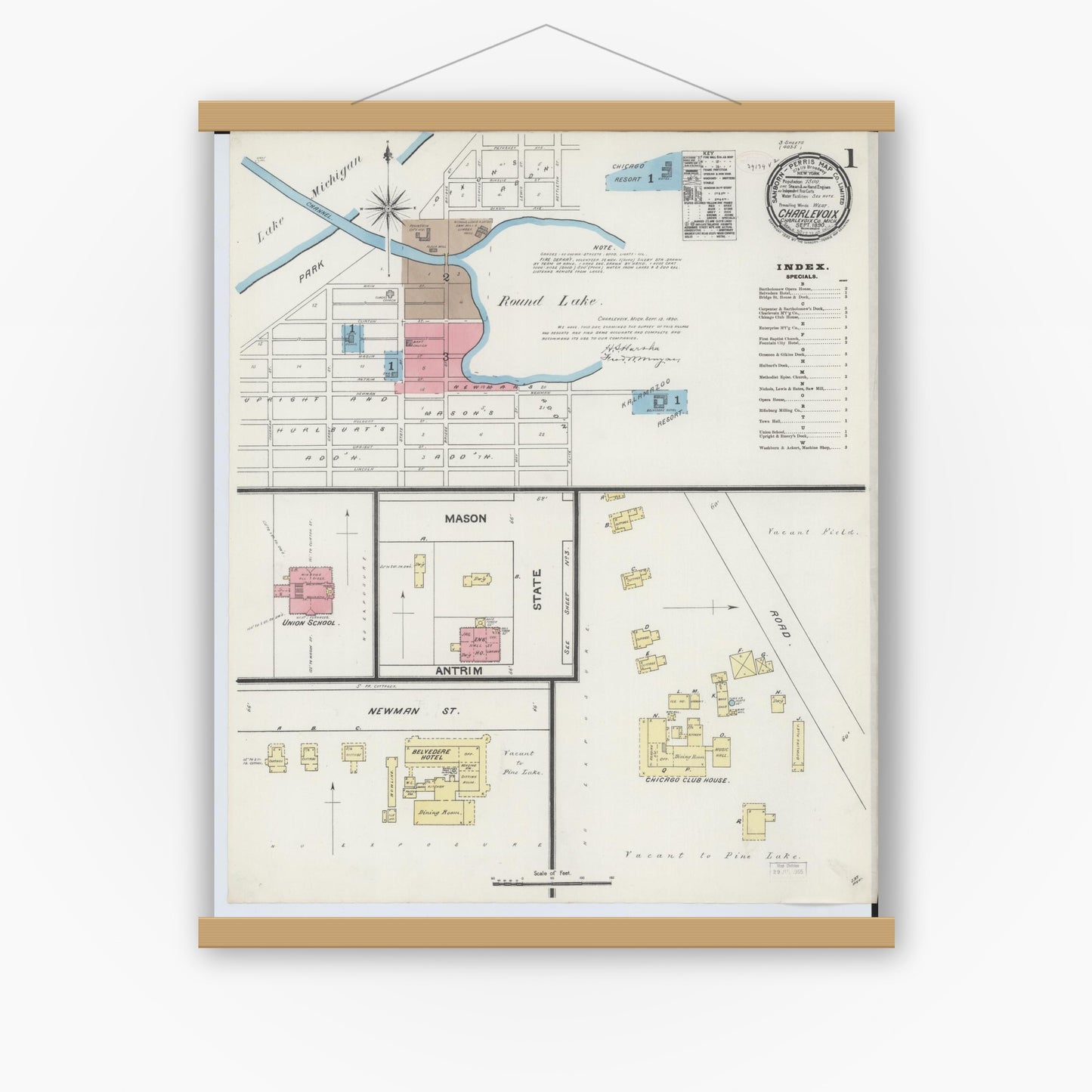 Old map wall art mockup — magnetic wood frame on white wall — Sanborn Fire Insurance Map from Charlevoix, Charlevoix County, Michigan (1890) - Complete Map Set