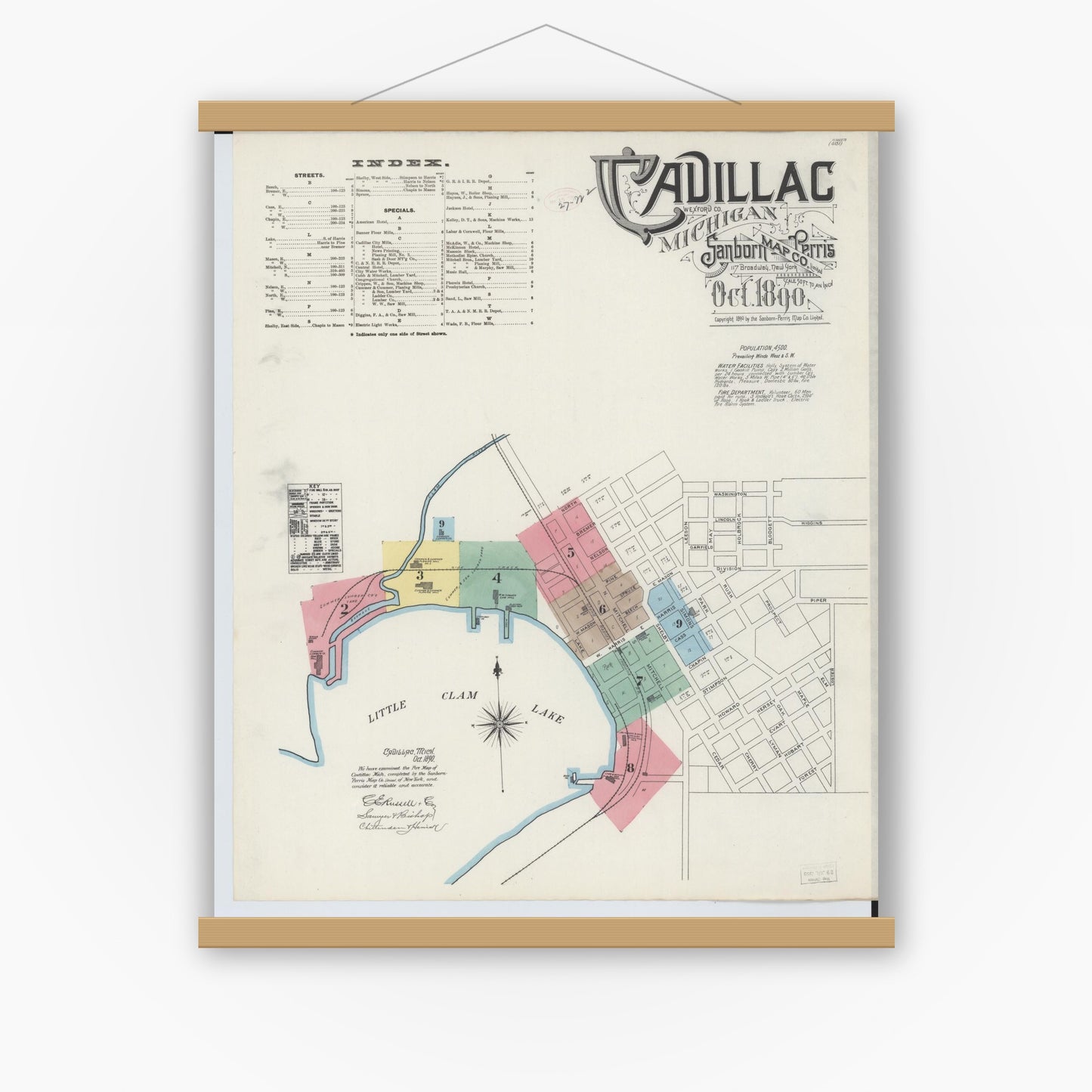 Old map wall art mockup — magnetic wood frame on white wall — Sanborn Fire Insurance Map from Cadillac, Wexford County, Michigan (1890) - Complete Map Set
