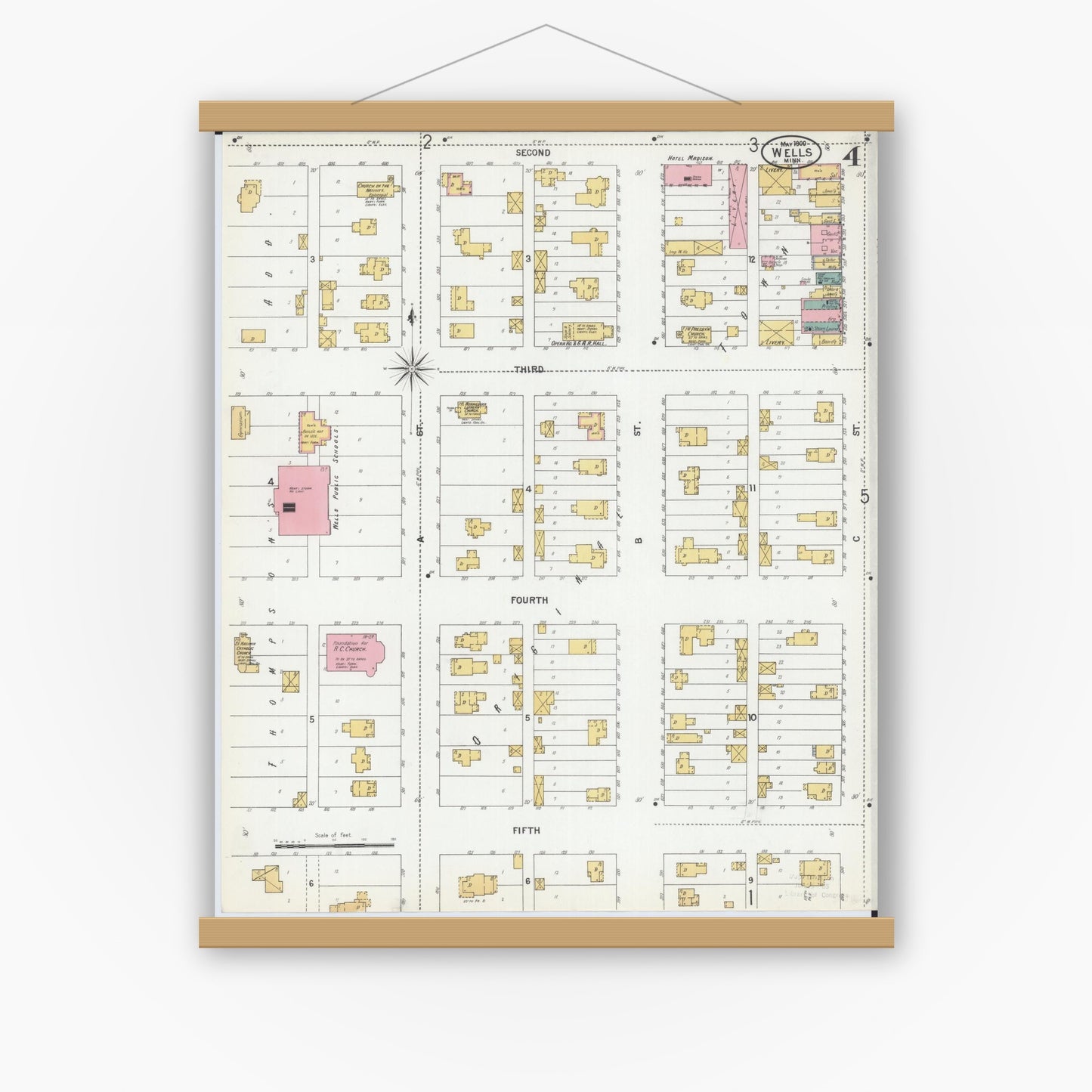 Old map wall art mockup — magnetic wood frame on white wall — Sanborn Fire Insurance Map from Wells, Faribault County, Minnesota (1900), Sheet #0004