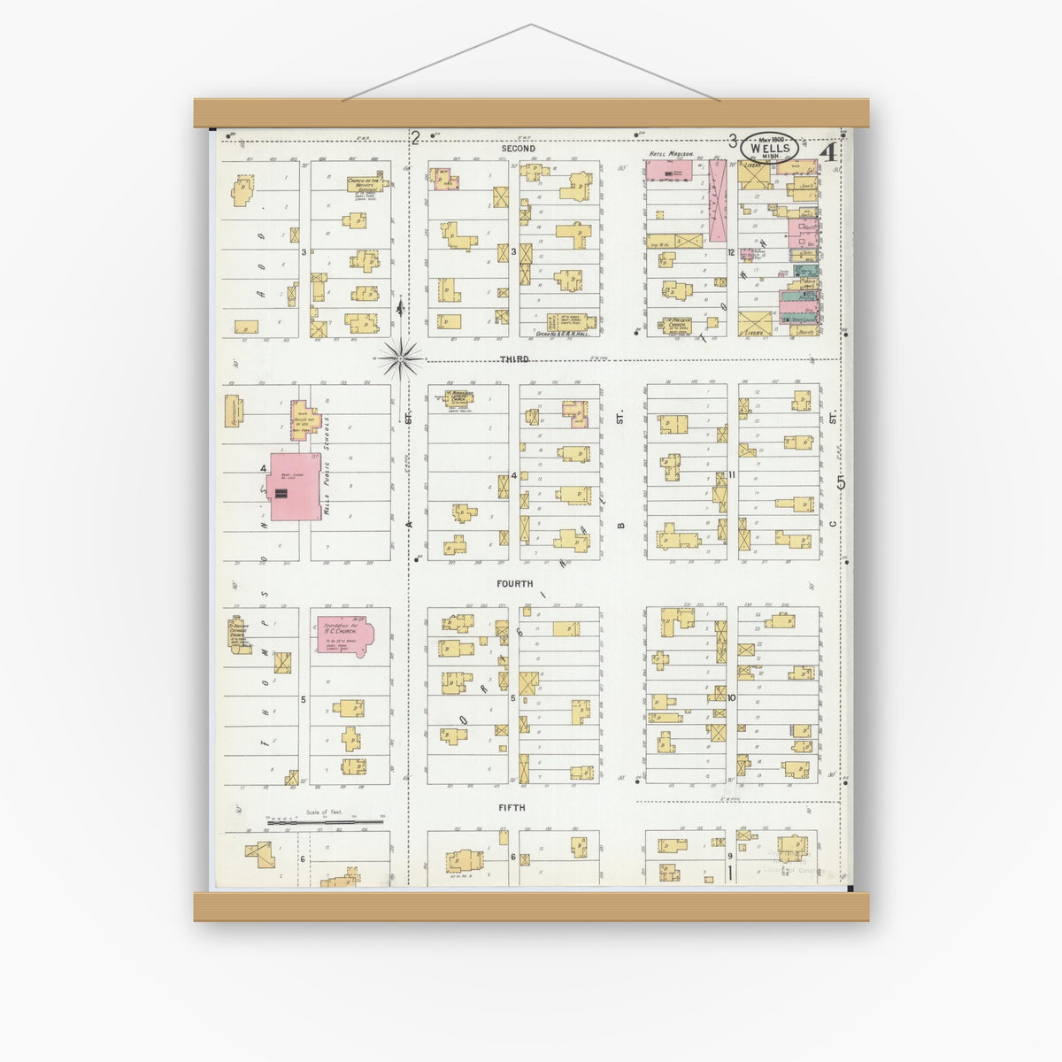 Old map wall art mockup — magnetic wood frame on white wall — Sanborn Fire Insurance Map from Wells, Faribault County, Minnesota (1900), Sheet #0004