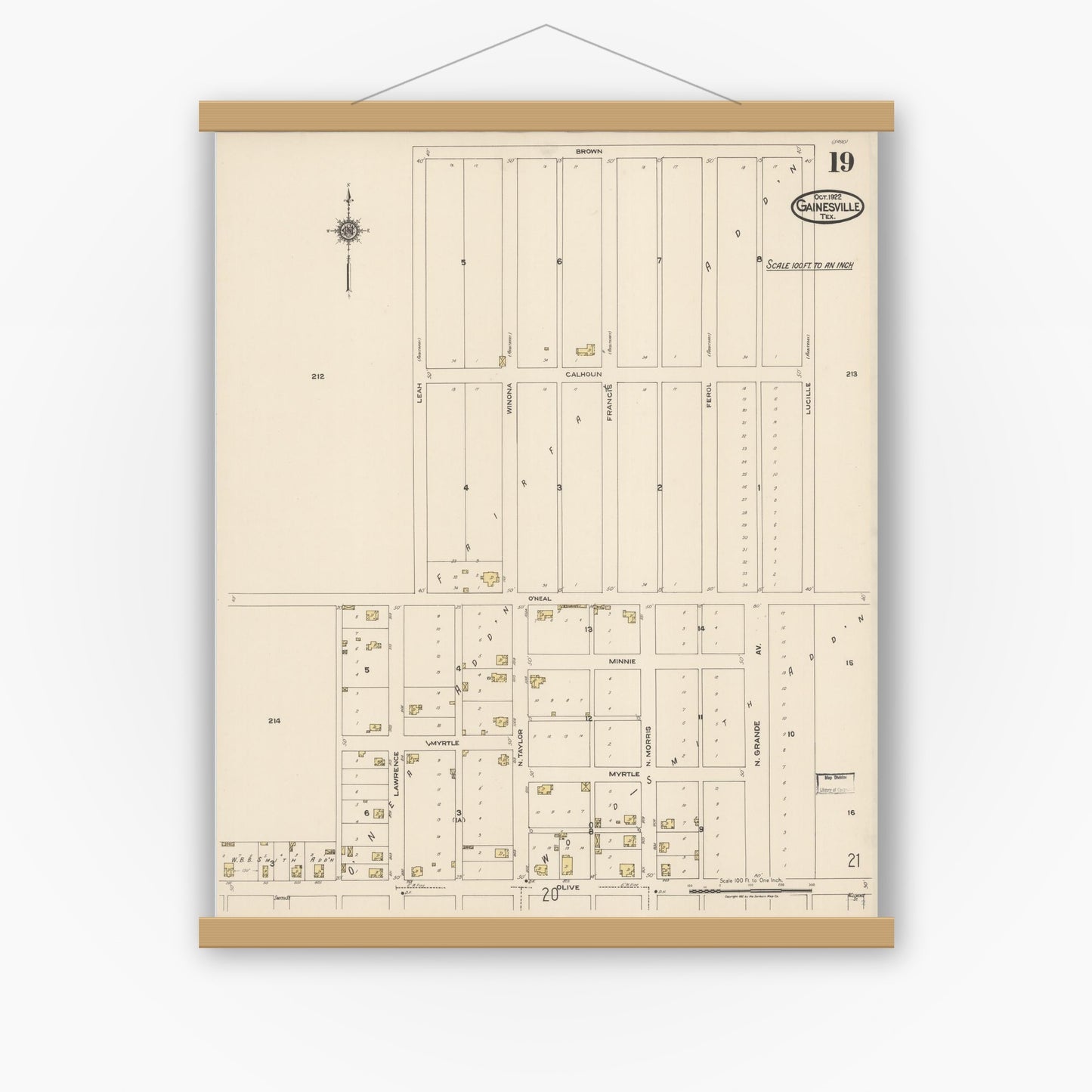 Old map wall art mockup — magnetic wood frame on white wall — Sanborn Fire Insurance Map from Gainesville, Cooke County, Texas (1922), Sheet #0019