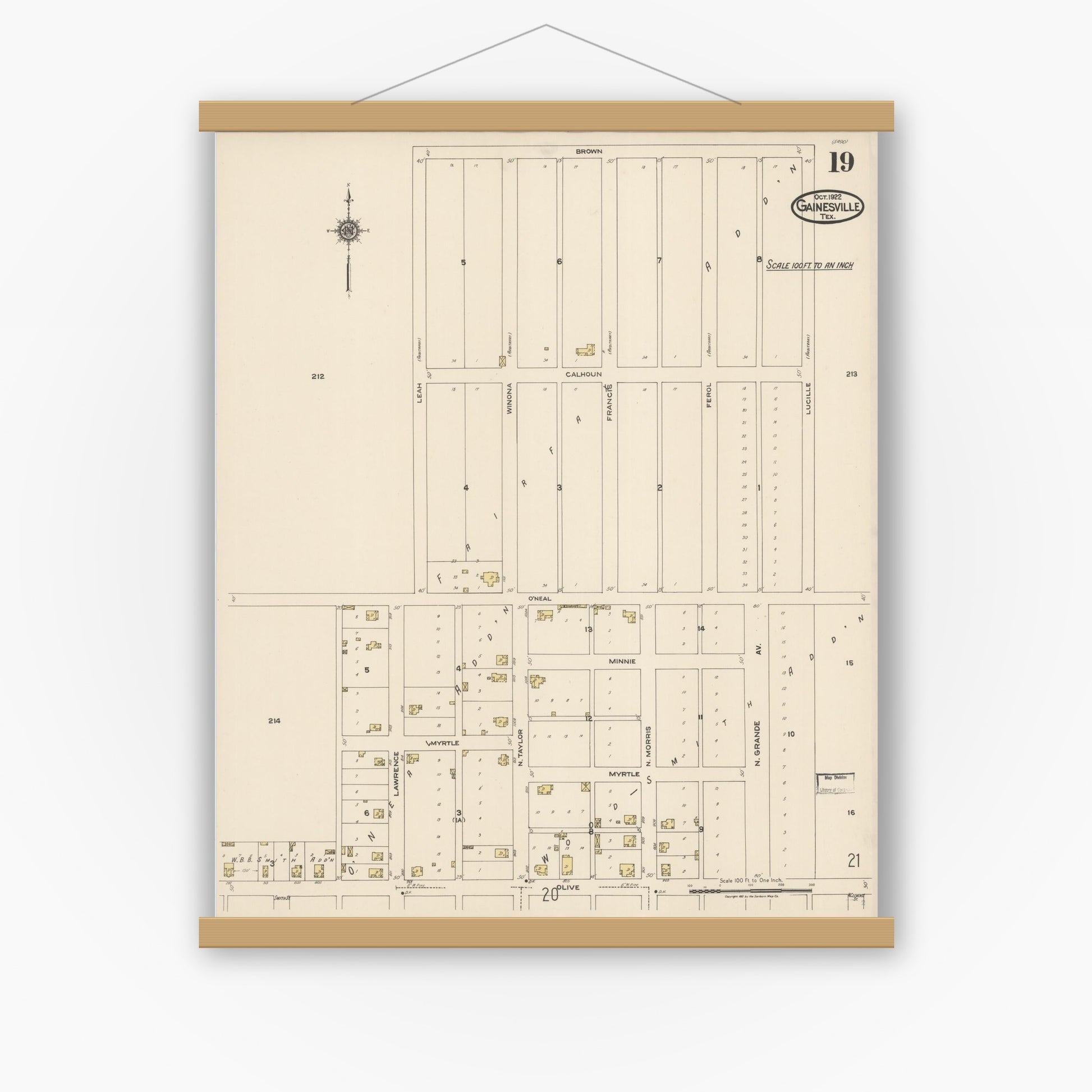 Old map wall art mockup — magnetic wood frame on white wall — Sanborn Fire Insurance Map from Gainesville, Cooke County, Texas (1922), Sheet #0019
