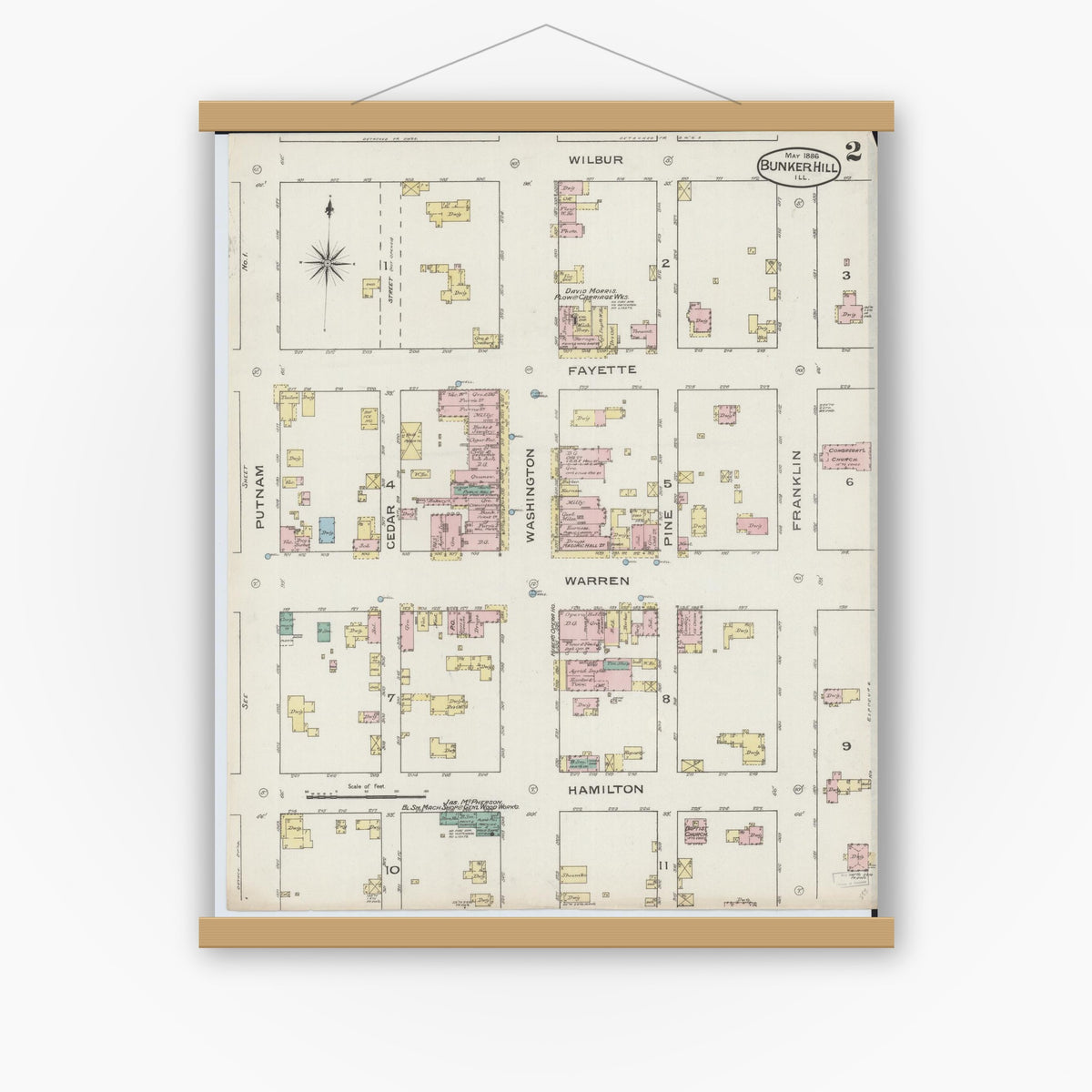 Old map wall art mockup — magnetic wood frame on white wall — Sanborn Fire Insurance Map from Bunker Hill, Macoupin County, Illinois (1886), Sheet #0002
