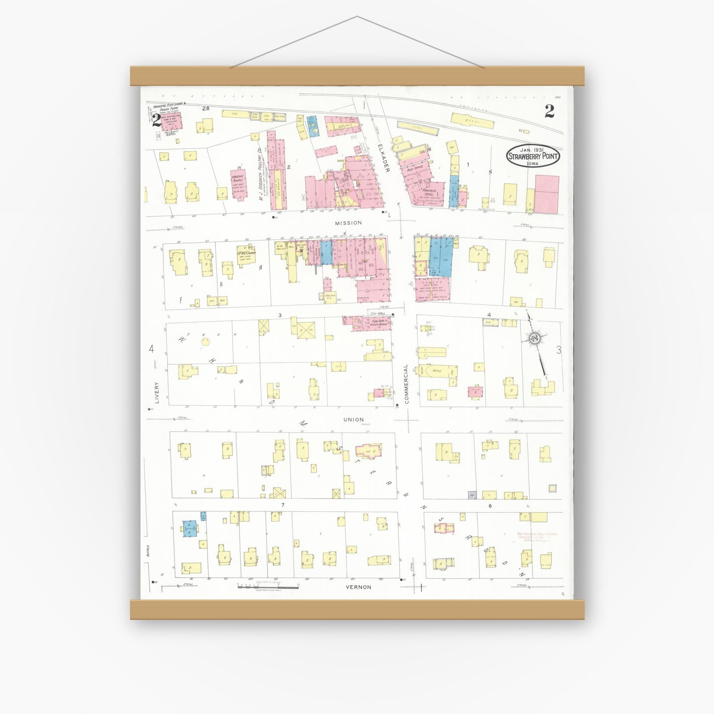 Old map wall art mockup — magnetic wood frame on white wall — Sanborn Fire Insurance Map from Strawberry Point, Clayton County, Iowa (1931), Sheet #0002
