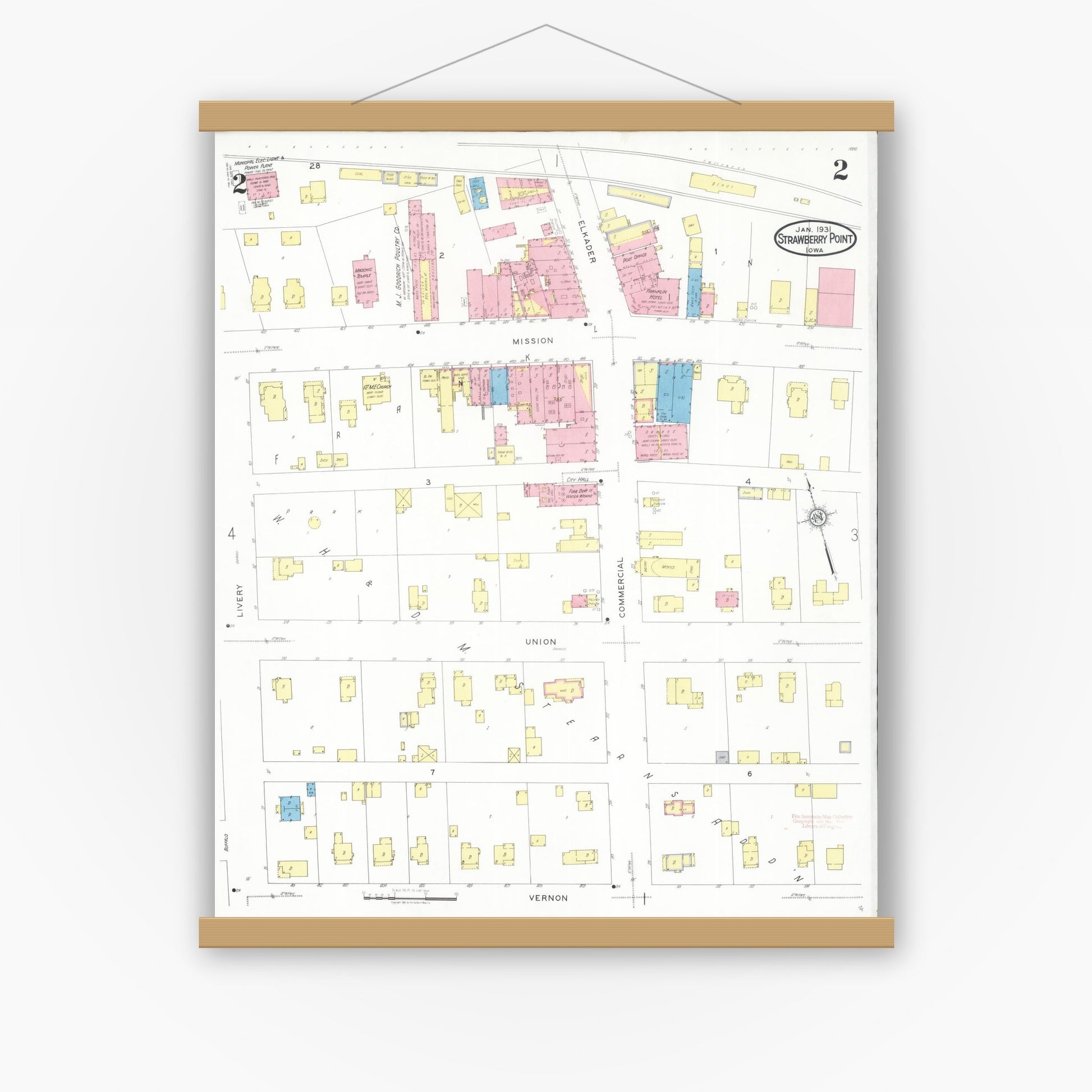 Old map wall art mockup — magnetic wood frame on white wall — Sanborn Fire Insurance Map from Strawberry Point, Clayton County, Iowa (1931), Sheet #0002