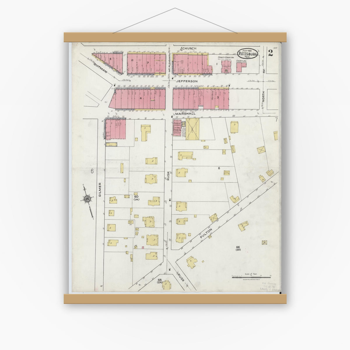 Old map wall art mockup — magnetic wood frame on white wall — Sanborn Fire Insurance Map from Pittsburg, Camp County, Texas (1921), Sheet #0002