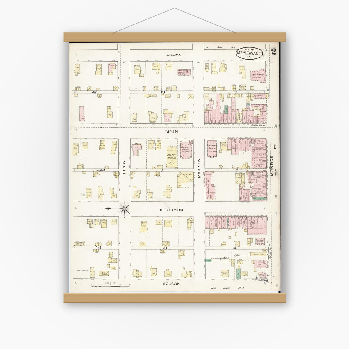 Old map wall art mockup — magnetic wood frame on white wall — Sanborn Fire Insurance Map from Mount Pleasant, Henry County, Iowa (1886), Sheet #0002