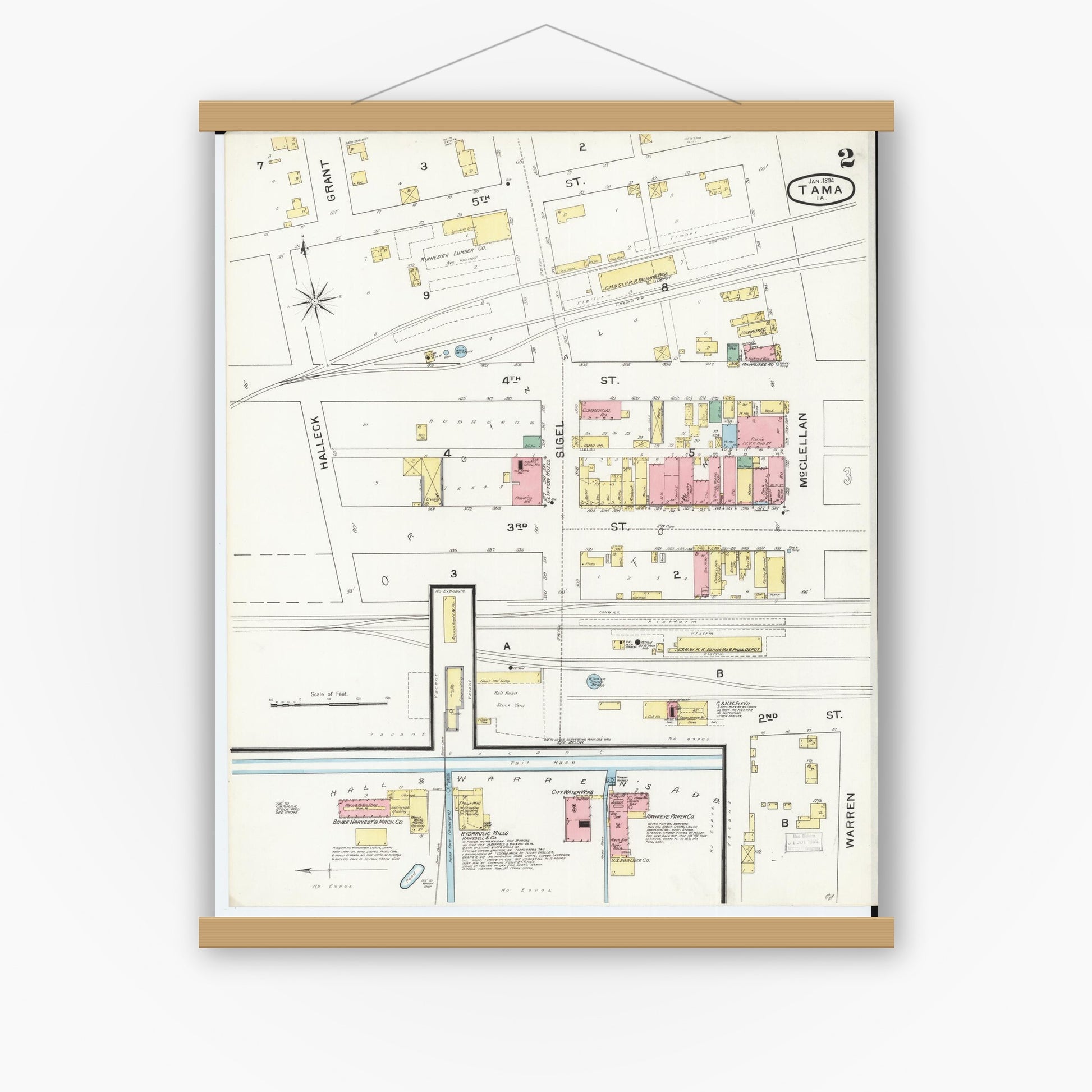 Old map wall art mockup — magnetic wood frame on white wall — Sanborn Fire Insurance Map from Tama, Tama County, Iowa (1894), Sheet #0002
