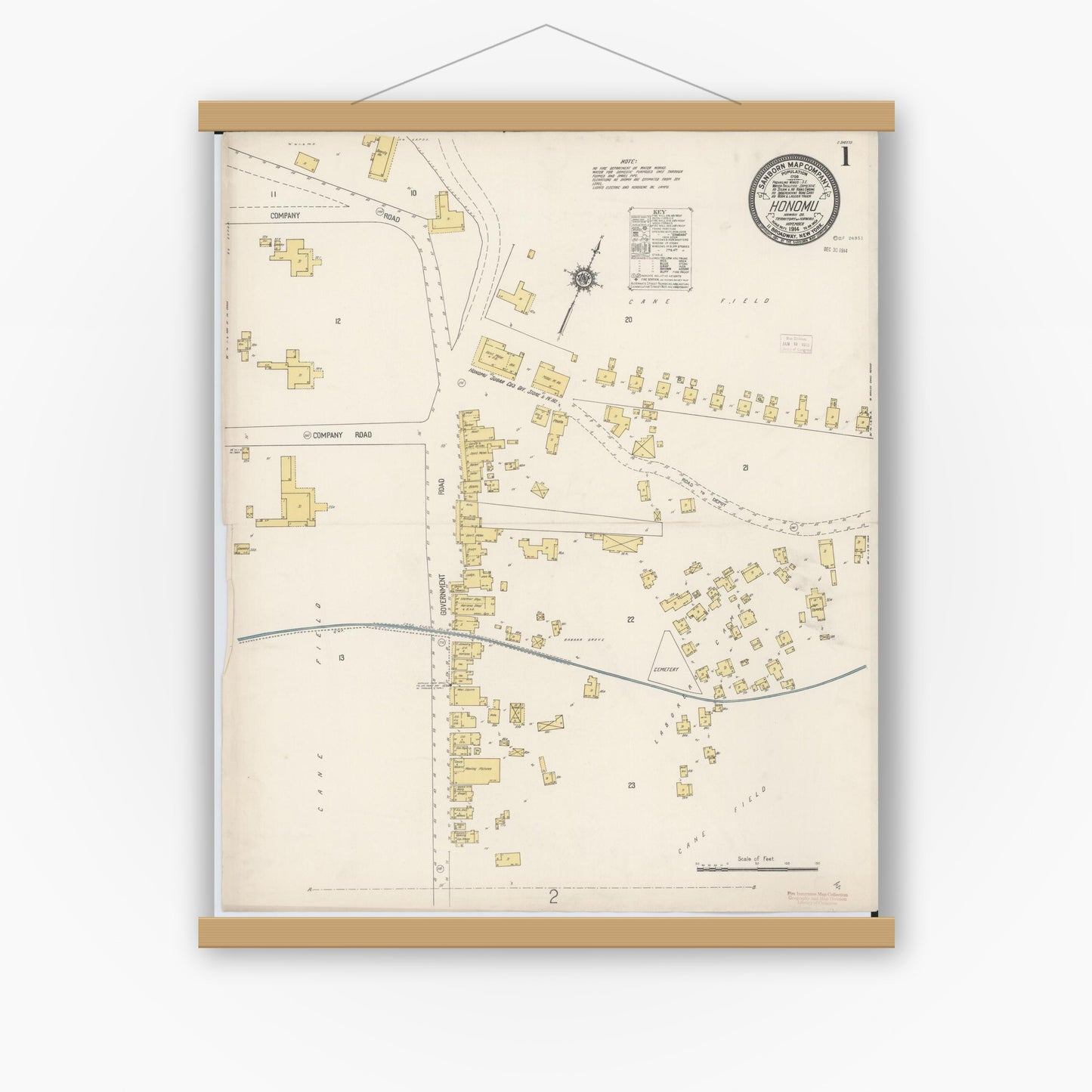 Old map wall art mockup — magnetic wood frame on white wall — Sanborn Fire Insurance Map from Honomu, Hawaii County, Hawaii (1914) - Complete Map Set